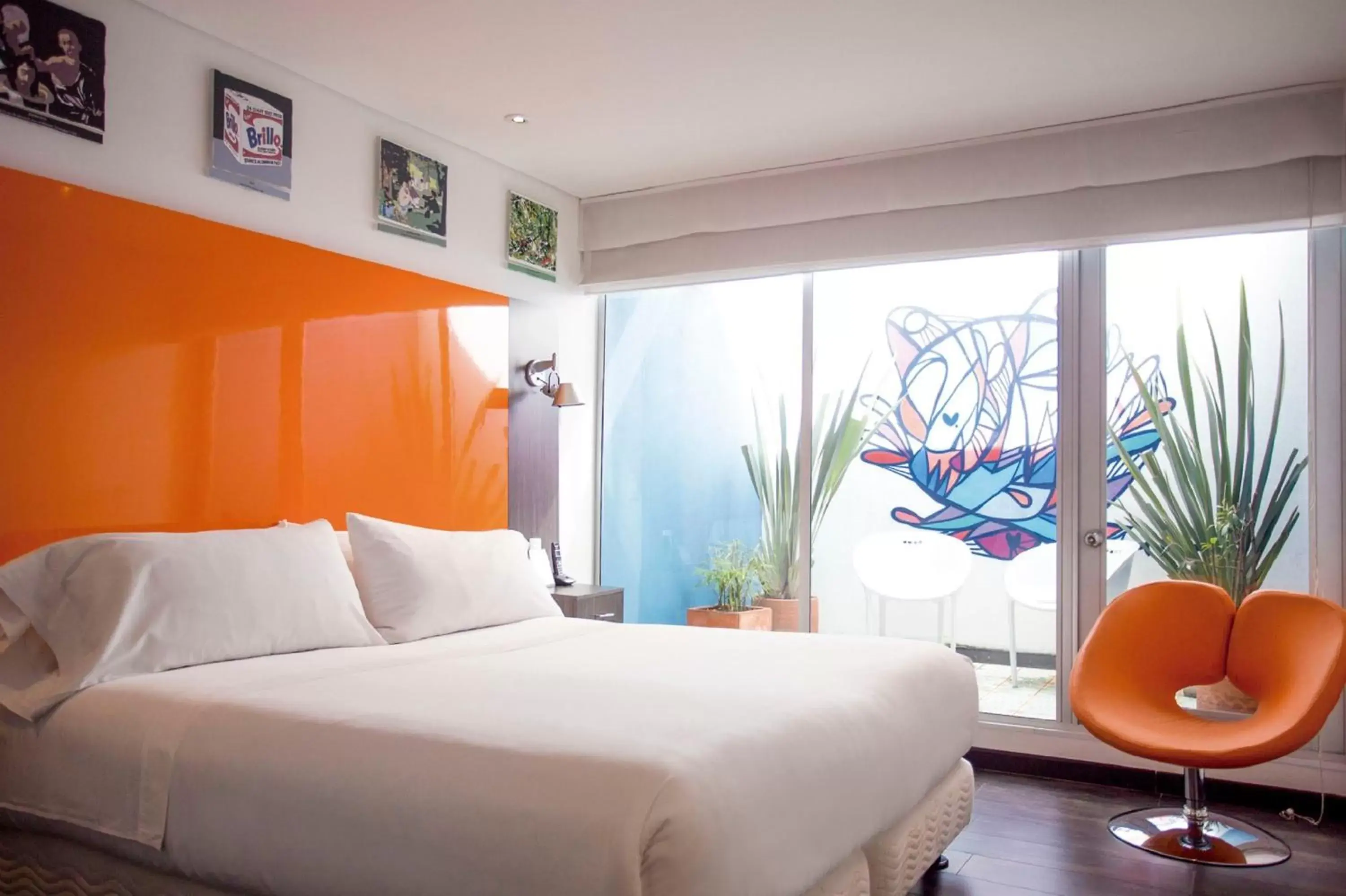 Bed in Hotel 104 Art Suites