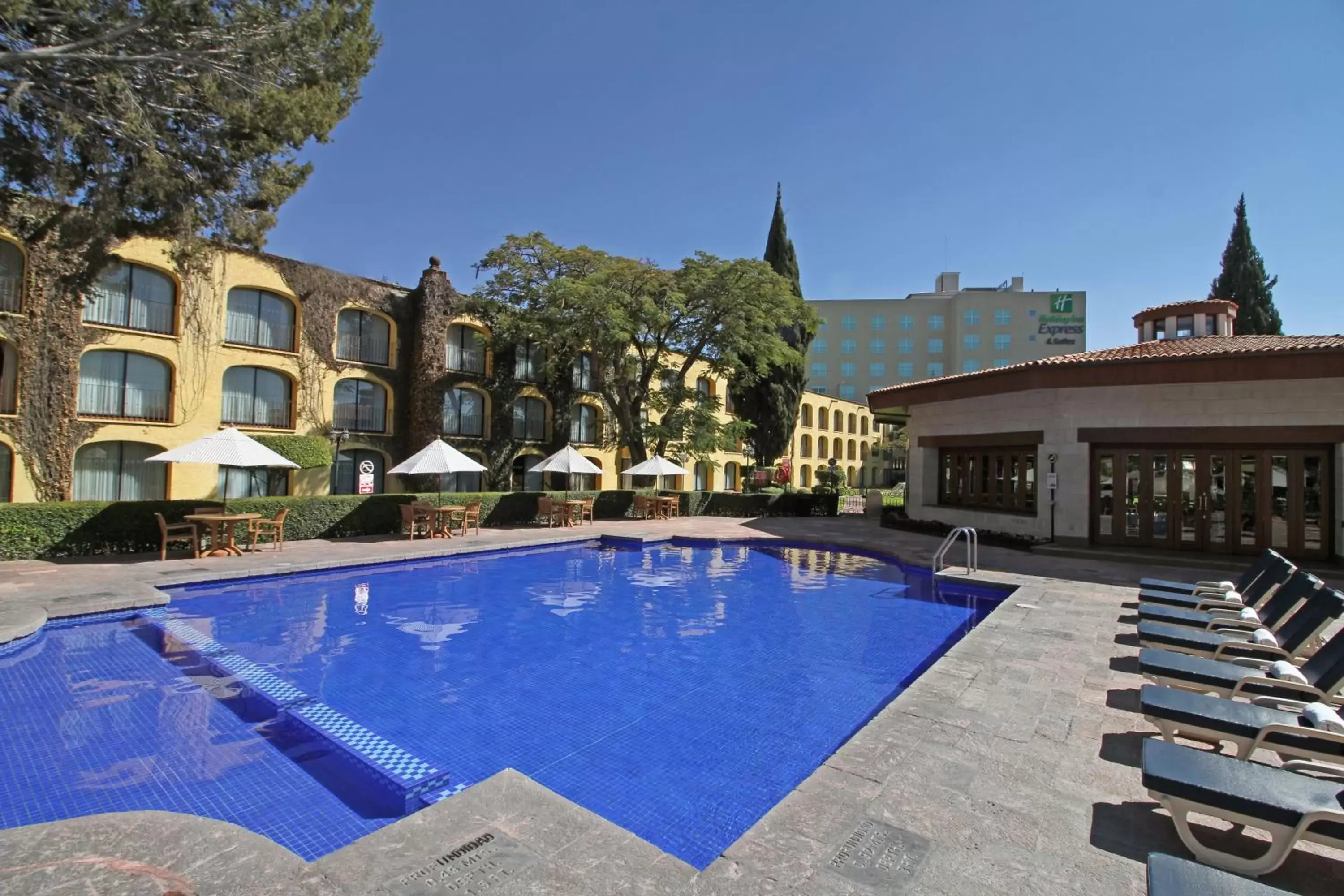 Swimming pool, Property Building in Holiday Inn Queretaro Centro Historico, an IHG Hotel