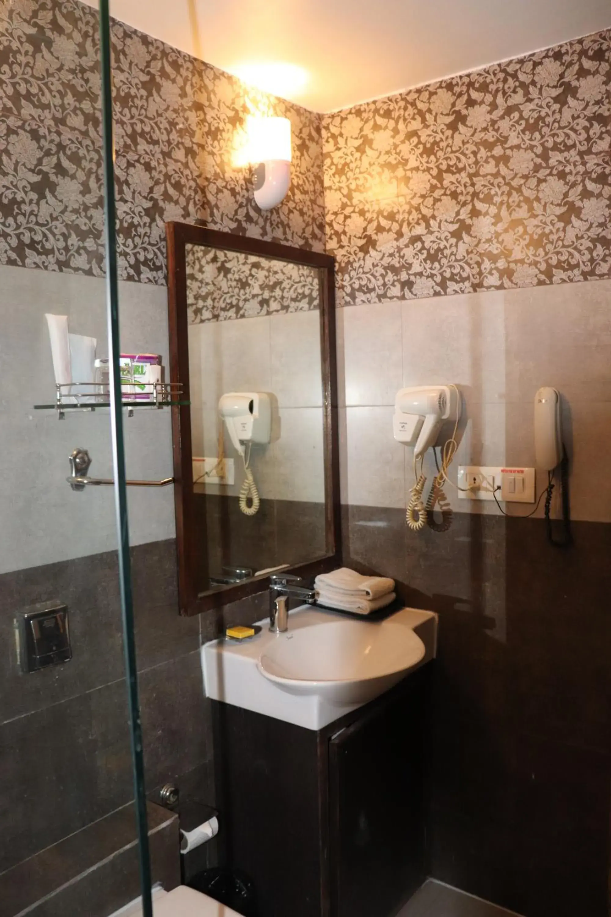 Bathroom in Regenta Resort Bhuj