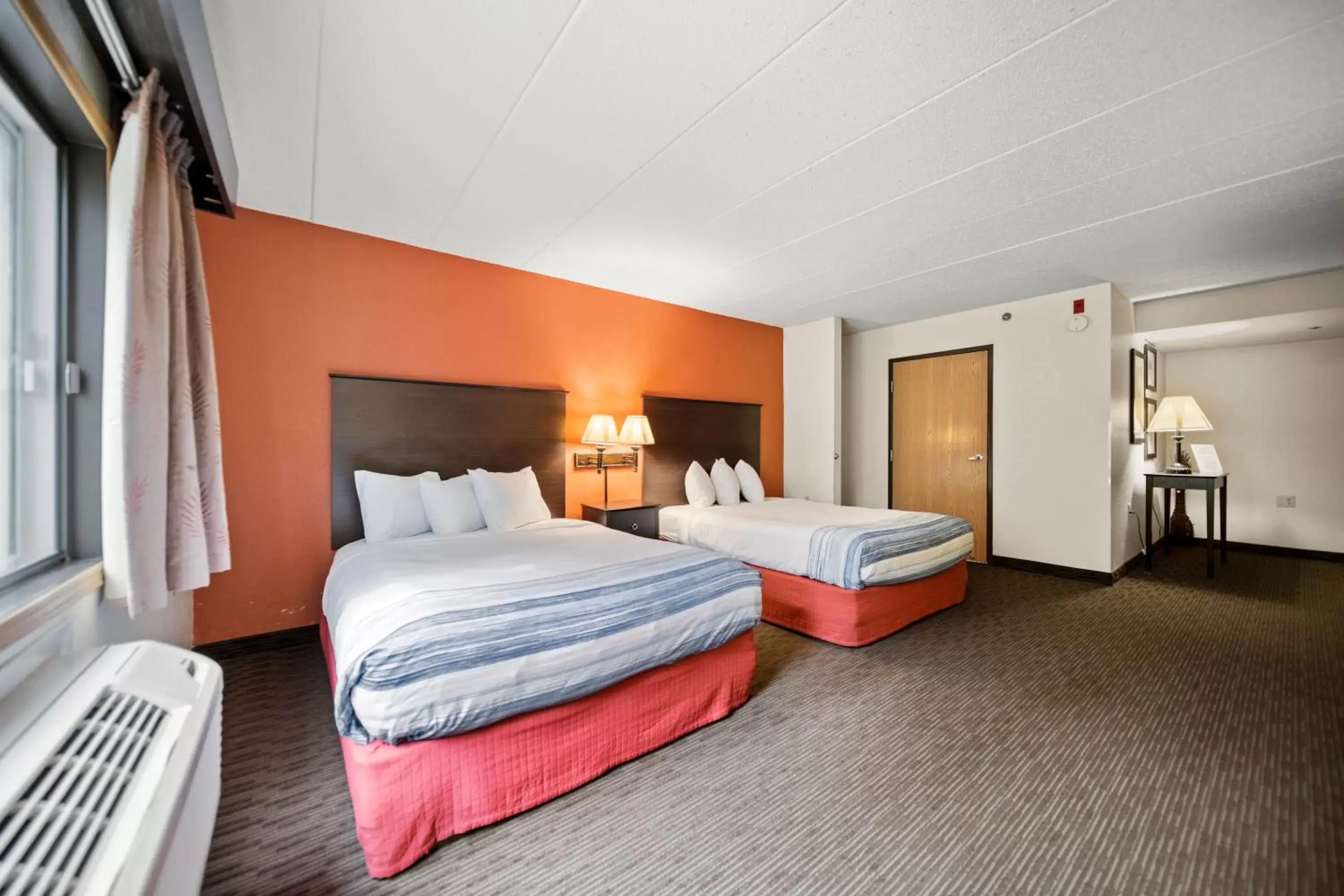 Queen Room with Two Queen Beds - Mobility Access/Non-Smoking in AmericInn by Wyndham Ames