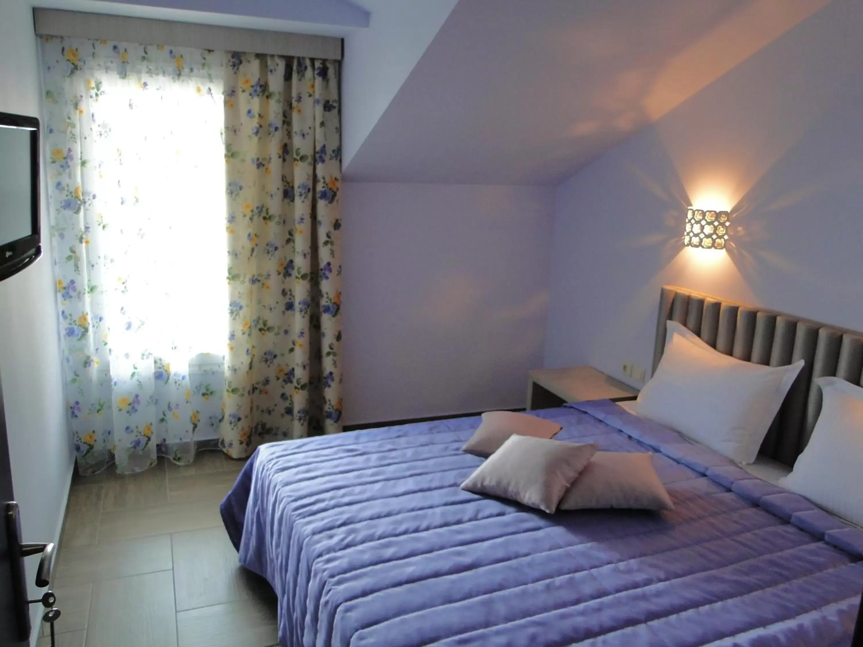 Comfort Quadruple Room in Hotel Olympos