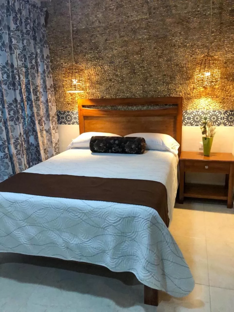 Bed in Hotel Boutique Bugambilias