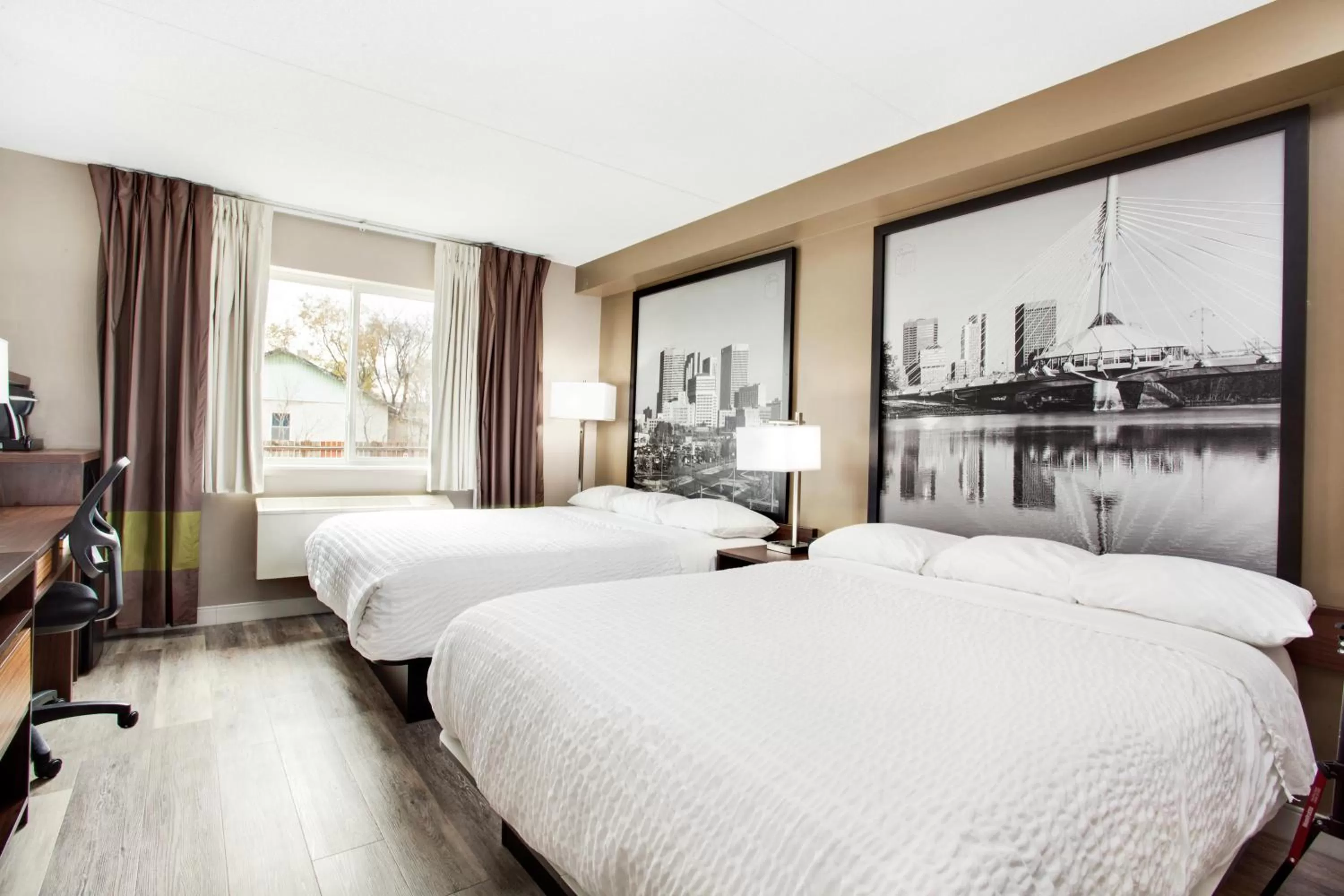 Deluxe Queen Room with Two Queen Beds - Pet Friendly in Super 8 by Wyndham Winnipeg West