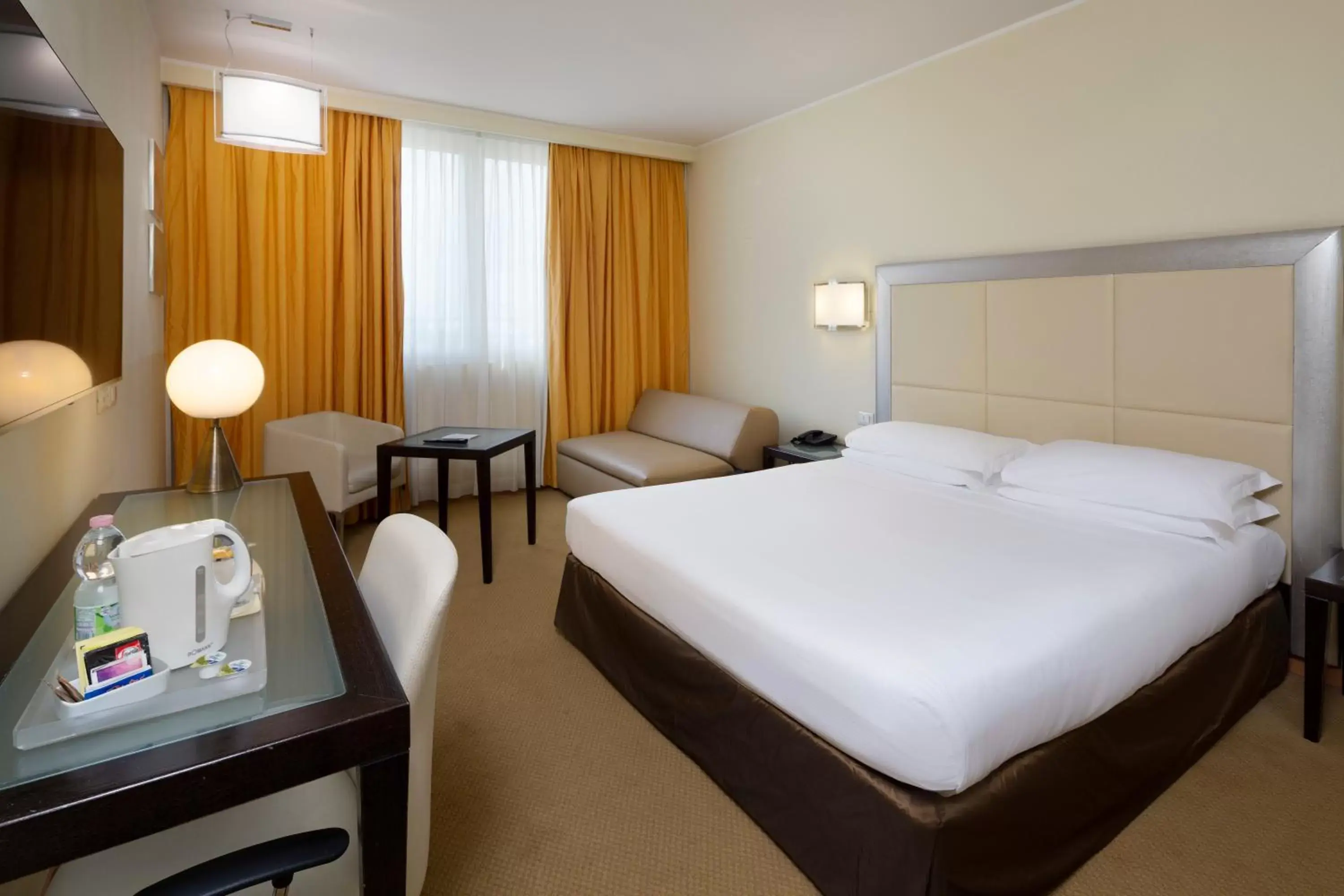 Photo of the whole room, Bed in Crowne Plaza Padova, an IHG Hotel
