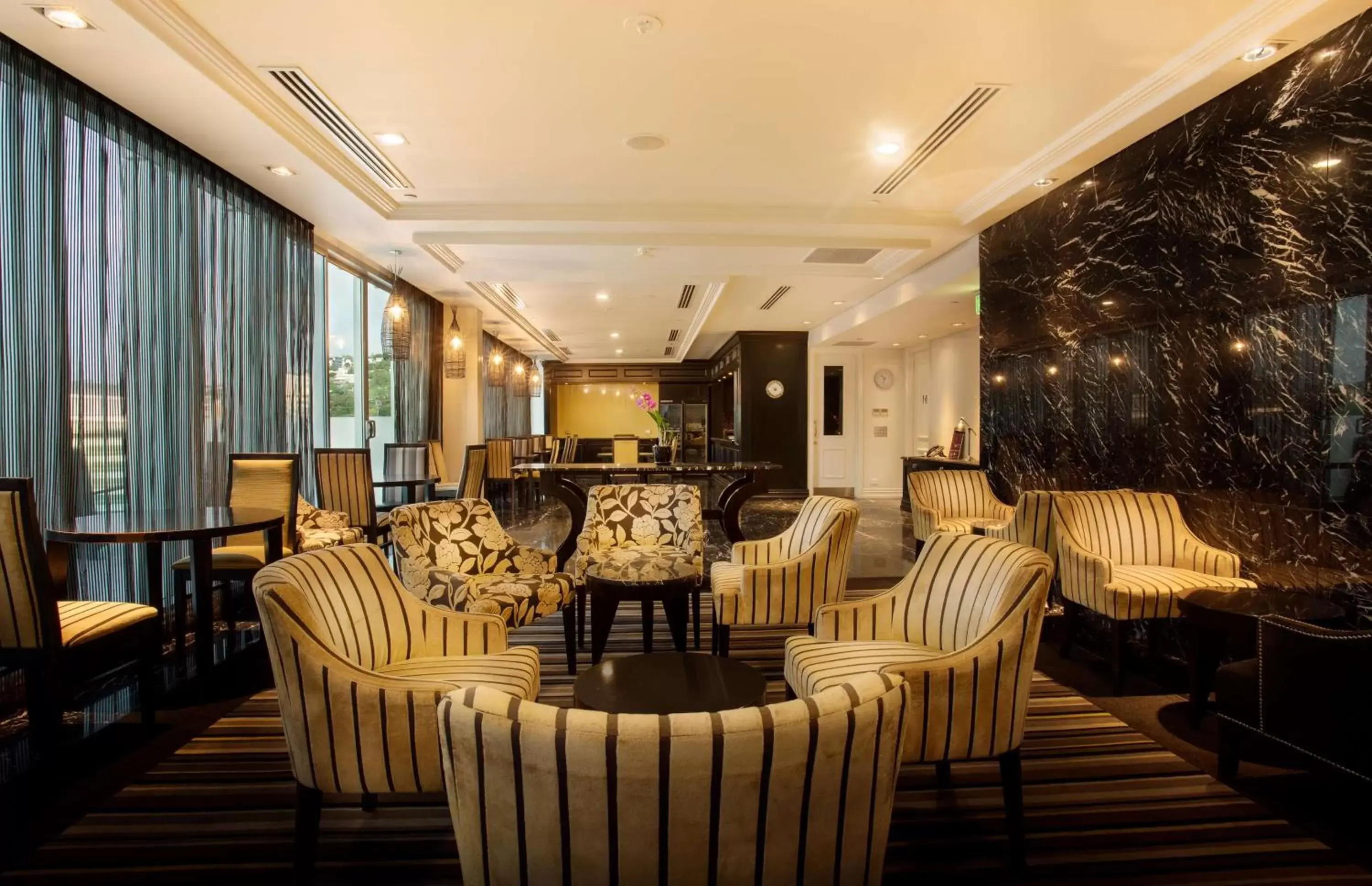Lounge or bar in Grand Papua Hotel, a member of Radisson Individuals