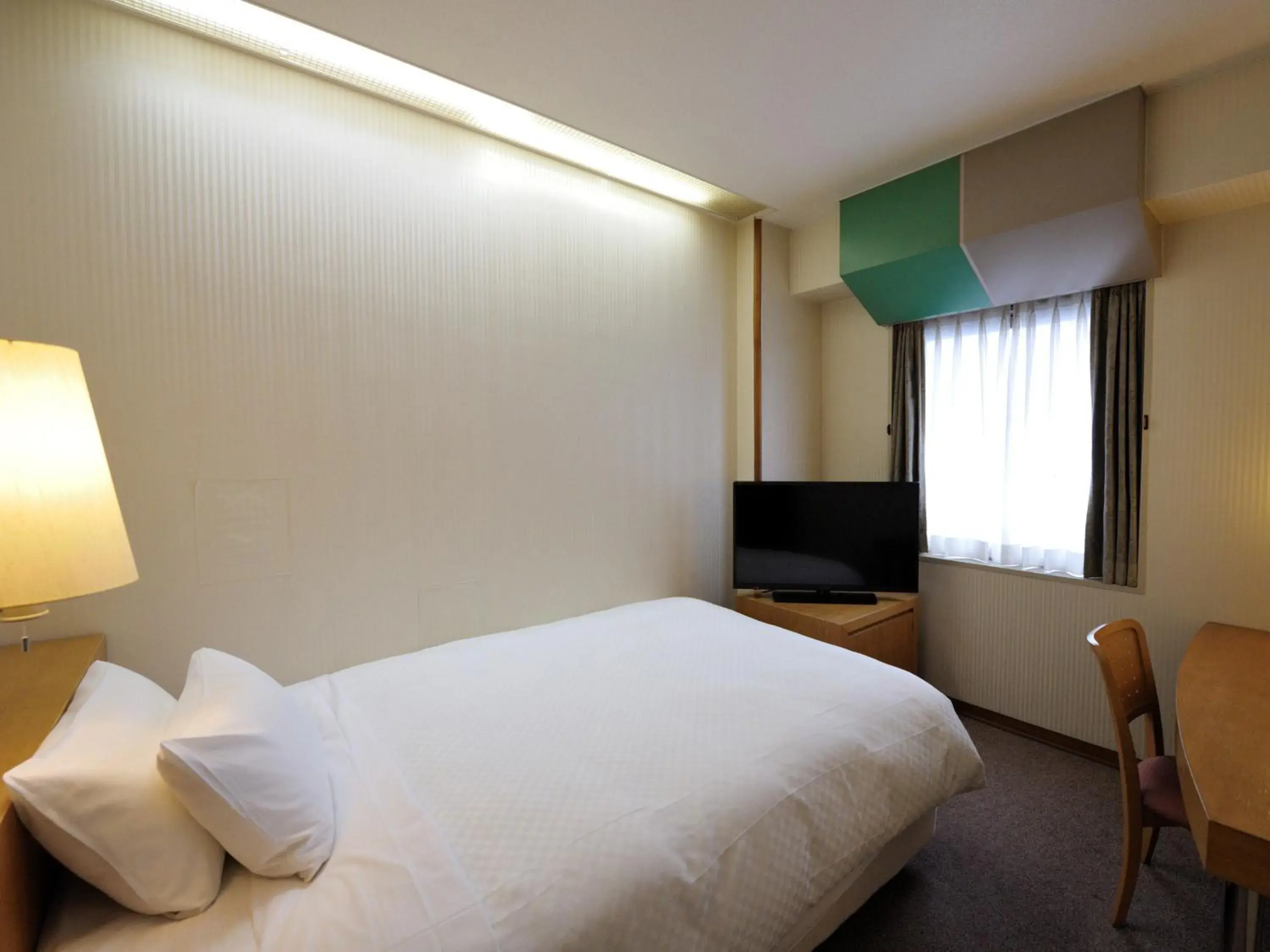 Bed in Court Hotel Fukuoka Tenjin