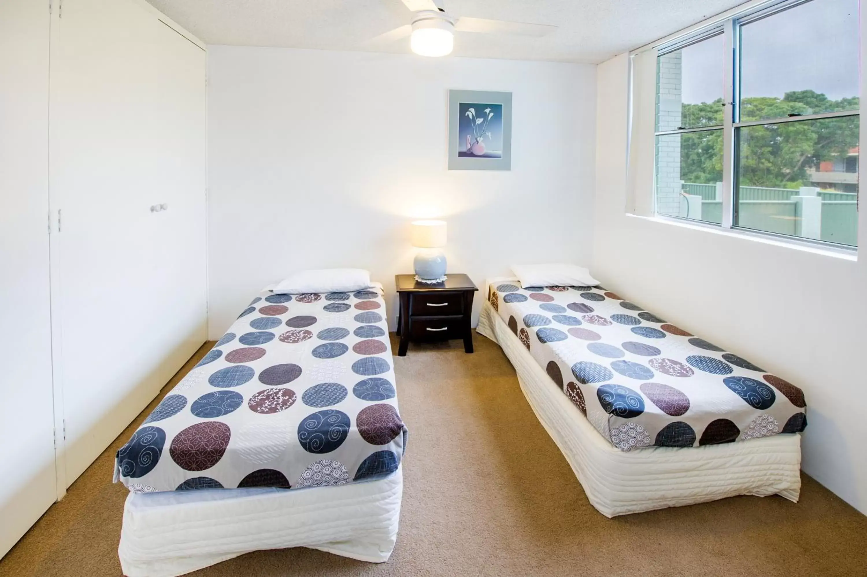 Bedroom, Bed in Tradewinds Apartments