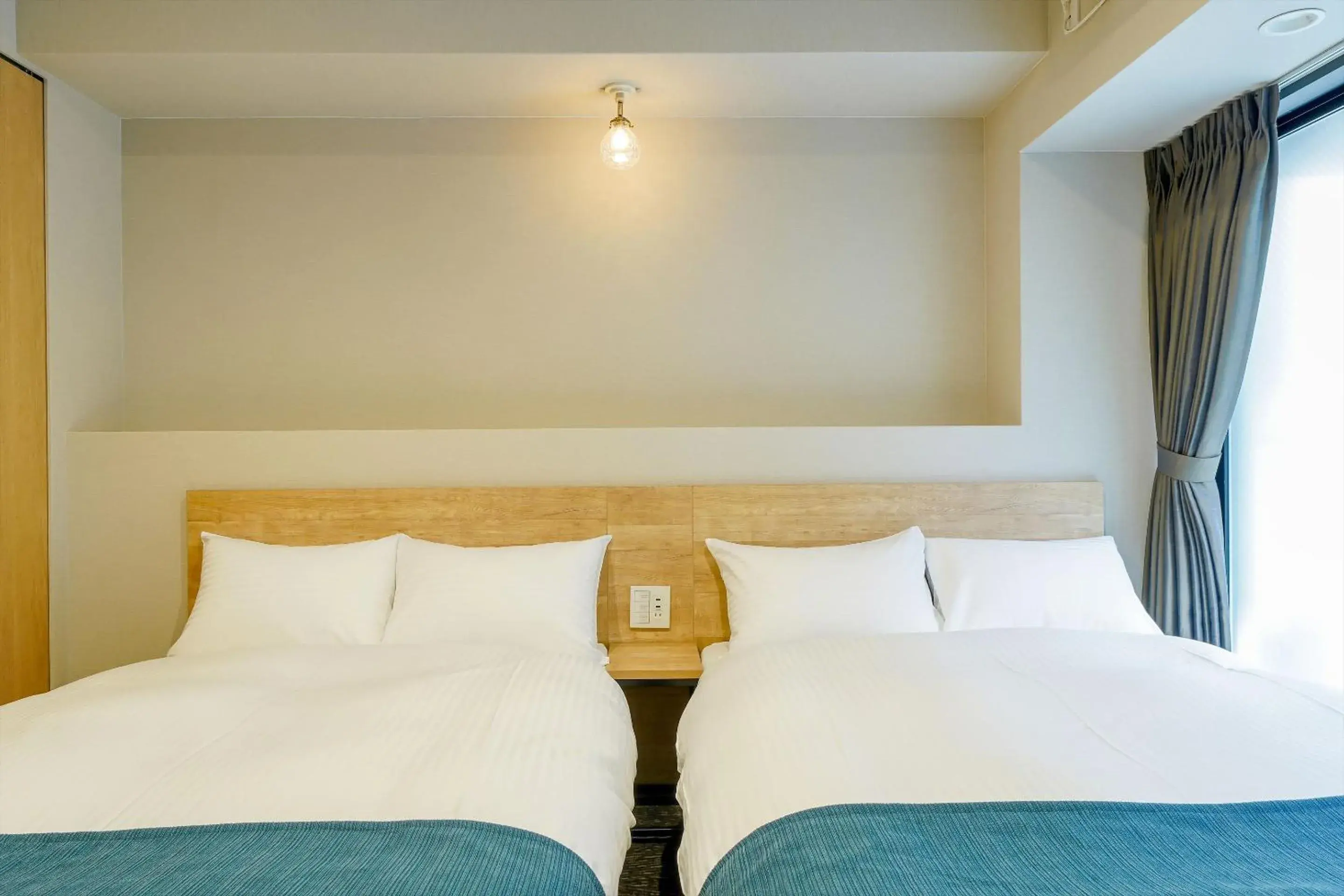 Bed in RESI STAY cotorune KYOTO