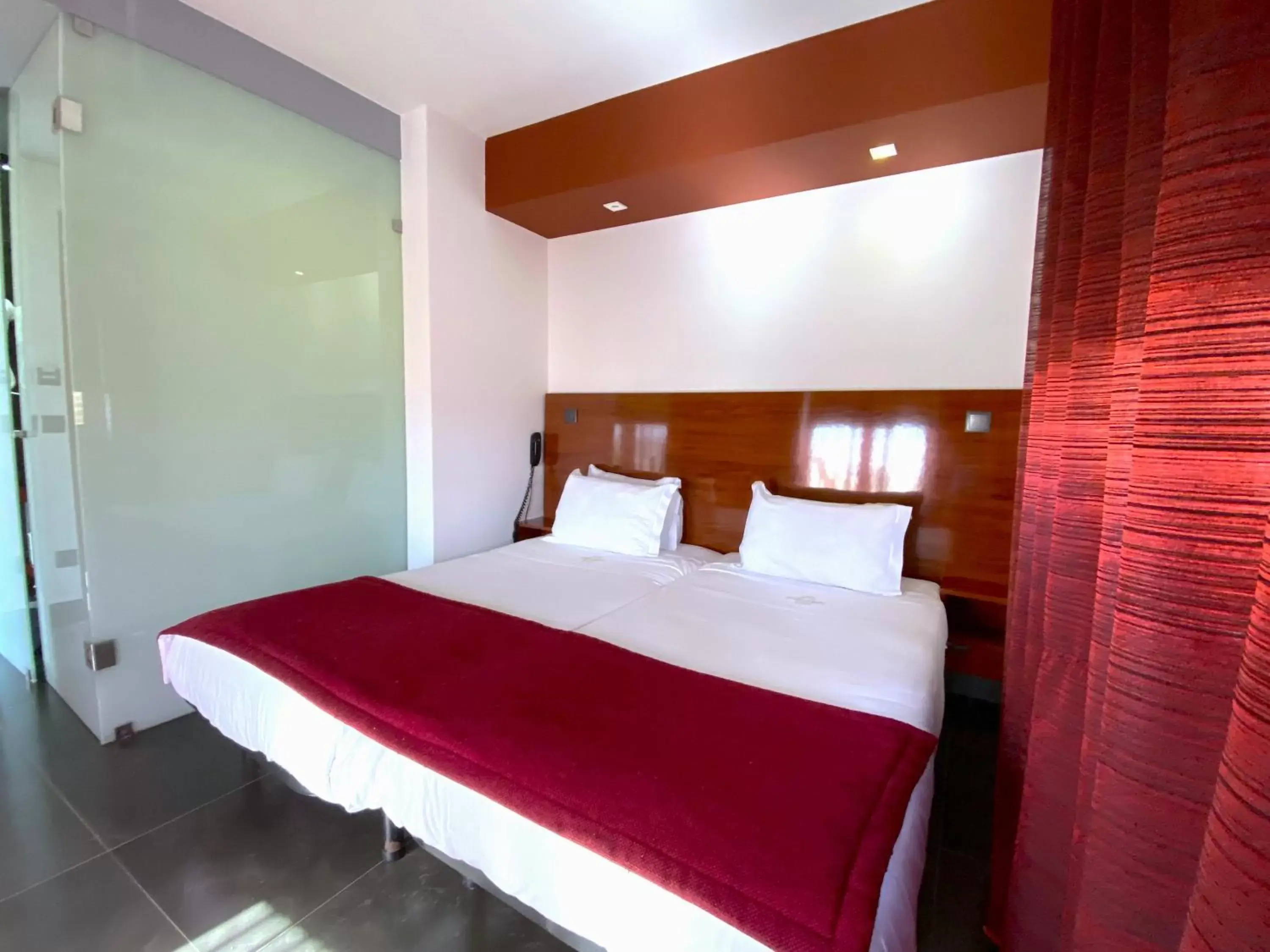 Bed in Hotel Oceano