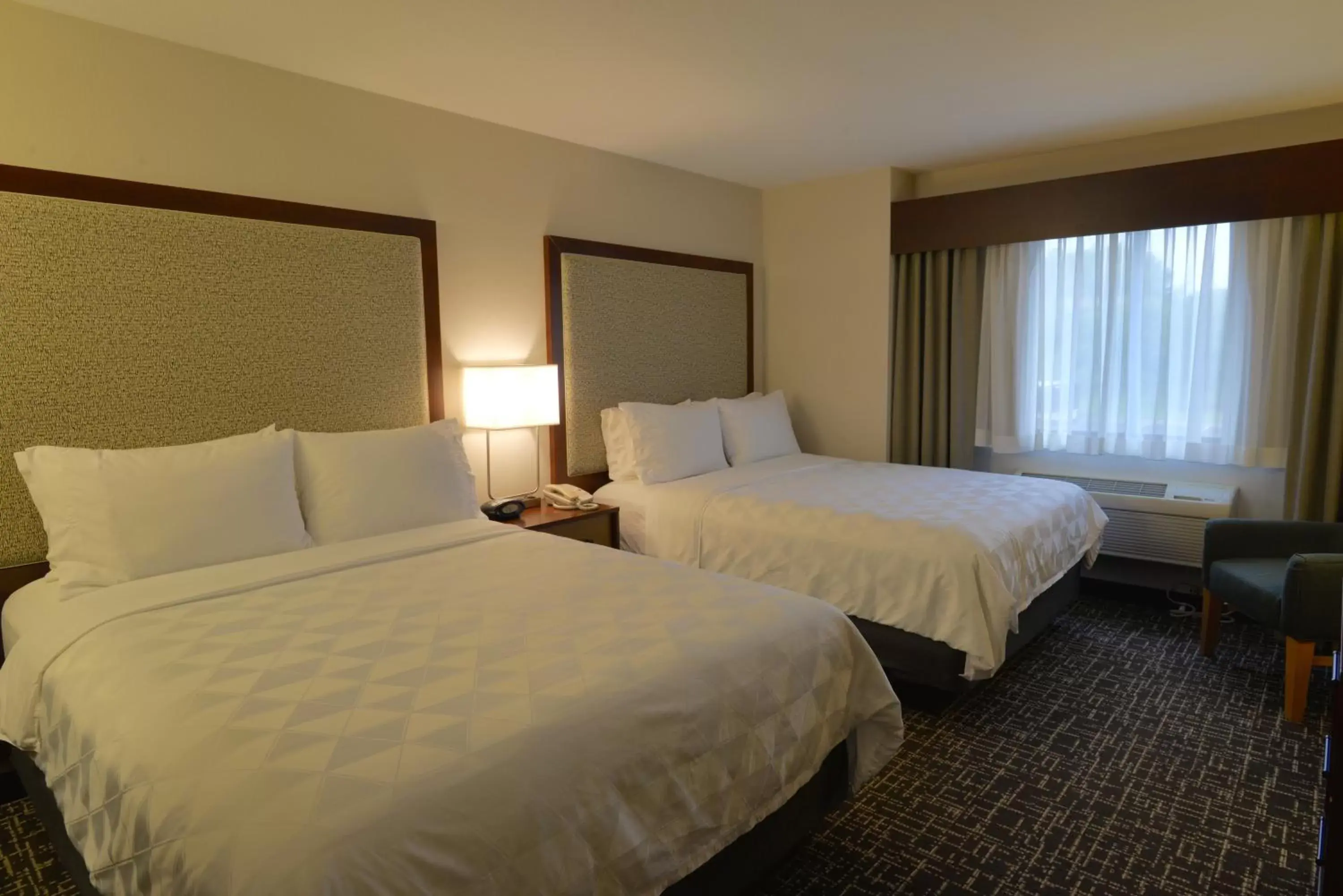 Photo of the whole room, Bed in Holiday Inn Hotel & Suites Minneapolis-Lakeville, an IHG Hotel