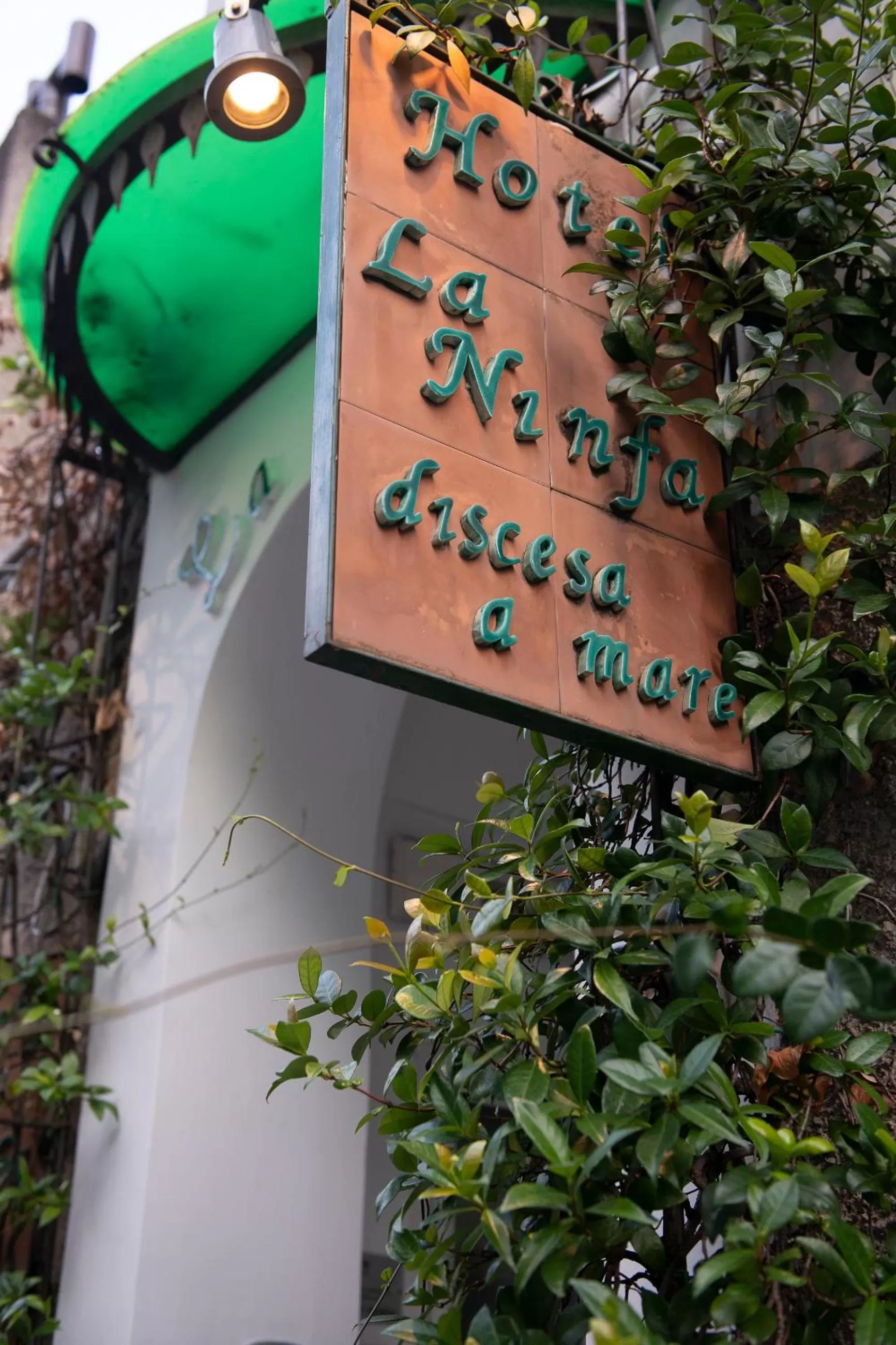 Property logo or sign in Hotel La Ninfa