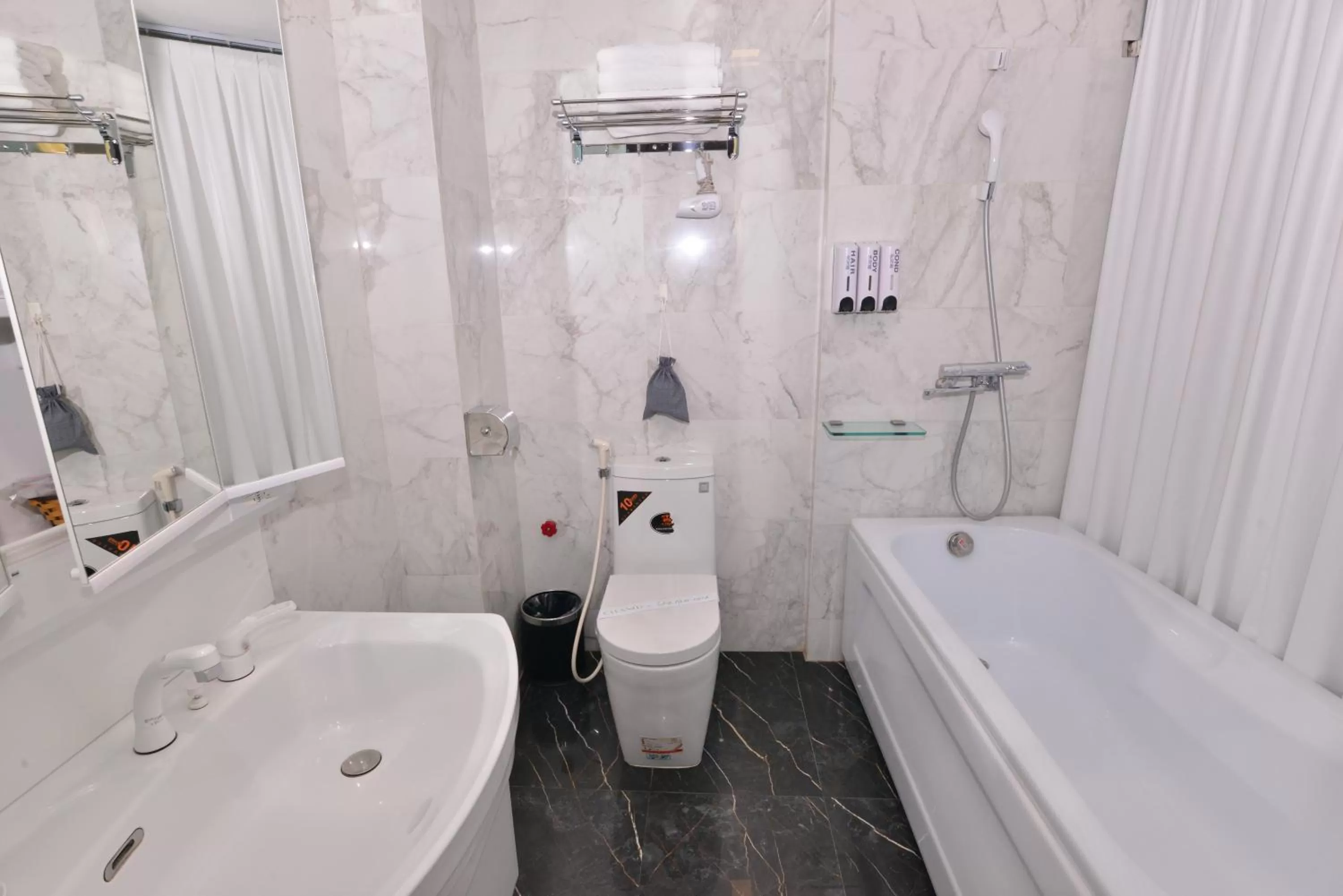 Toilet in Bella Rosa Suite Hotel & Spa