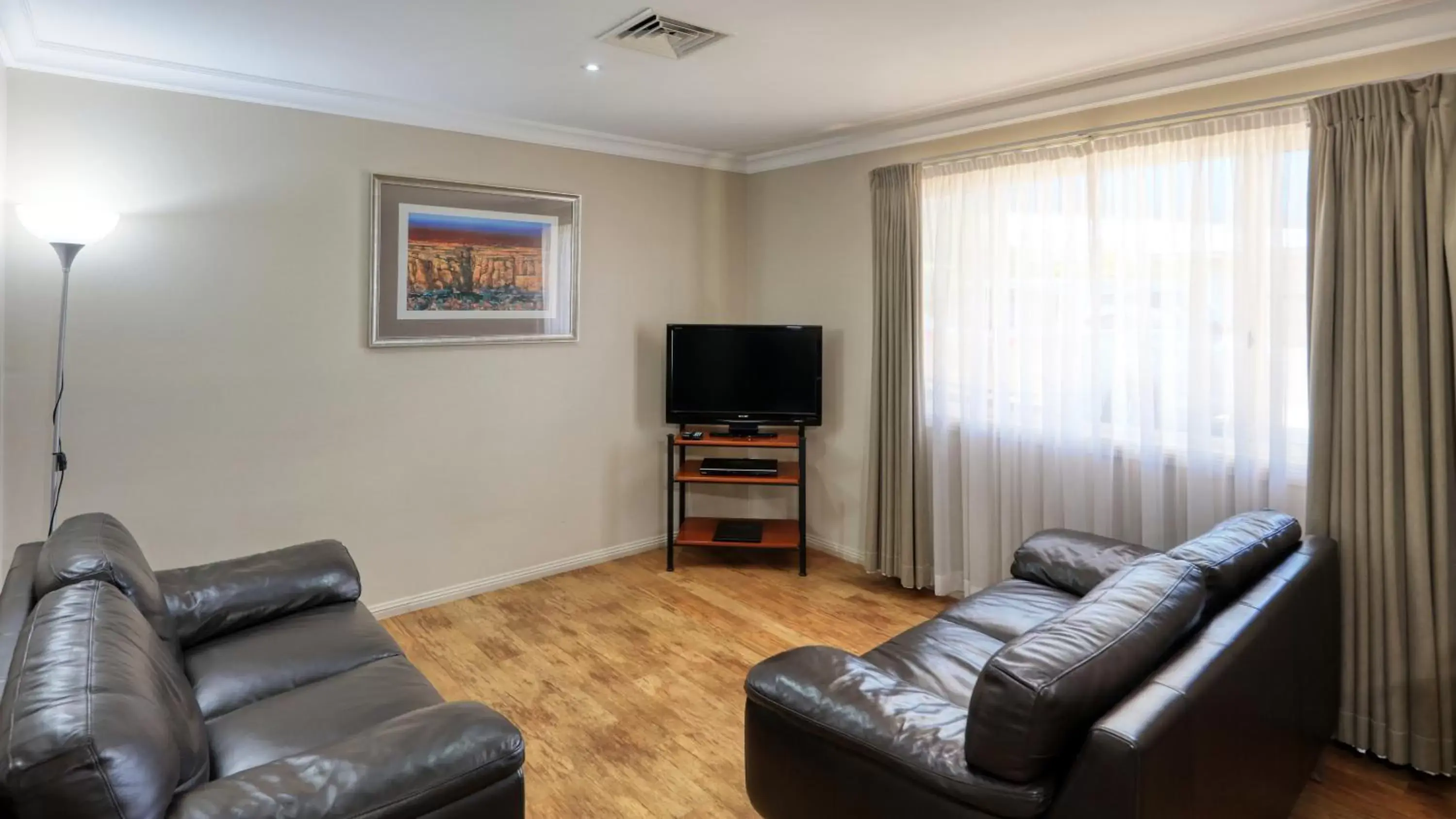 TV and multimedia, Seating Area in Edward Parry Motel and Apartments