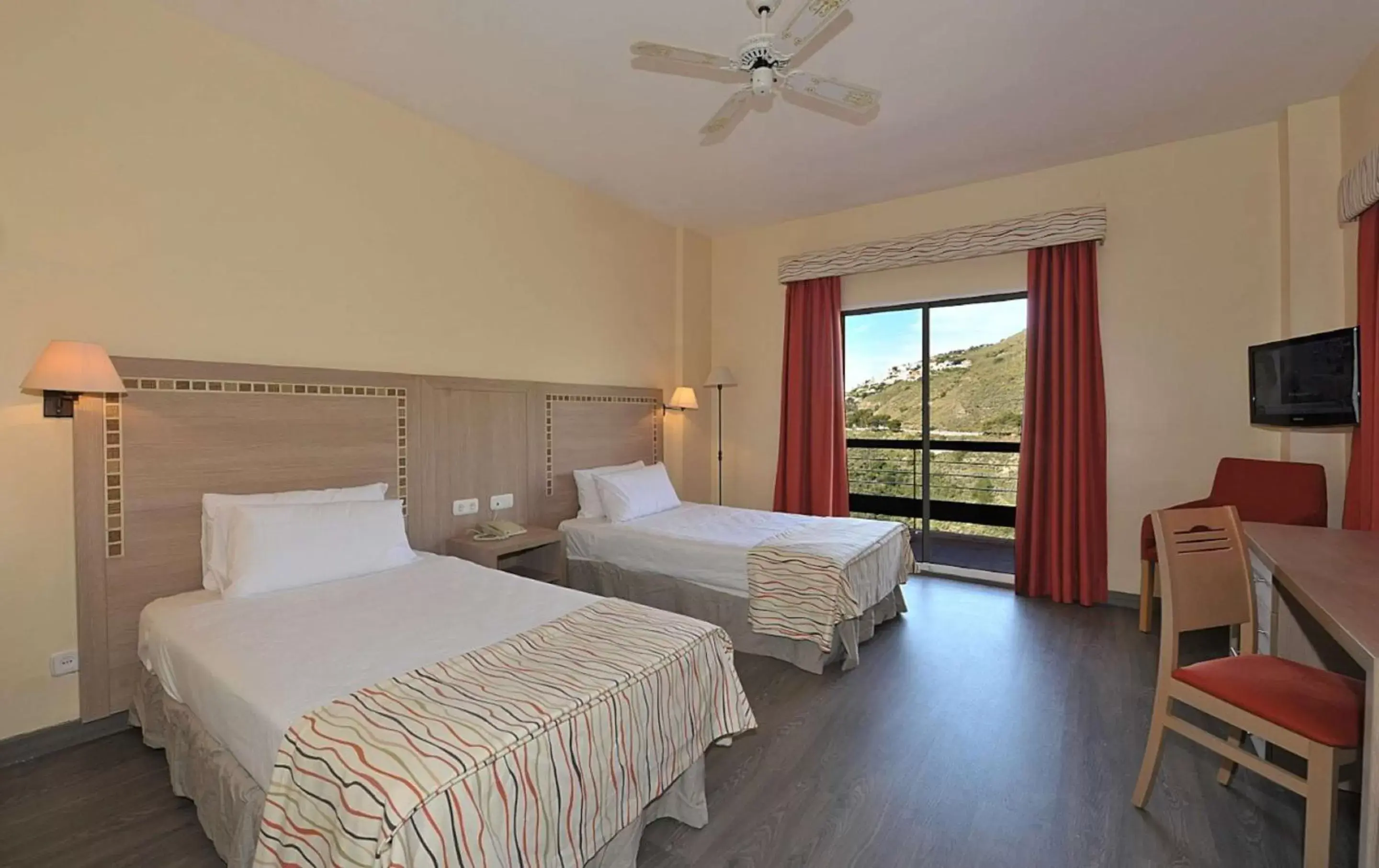 Photo of the whole room, Bed in Hotel Salobreña Suites