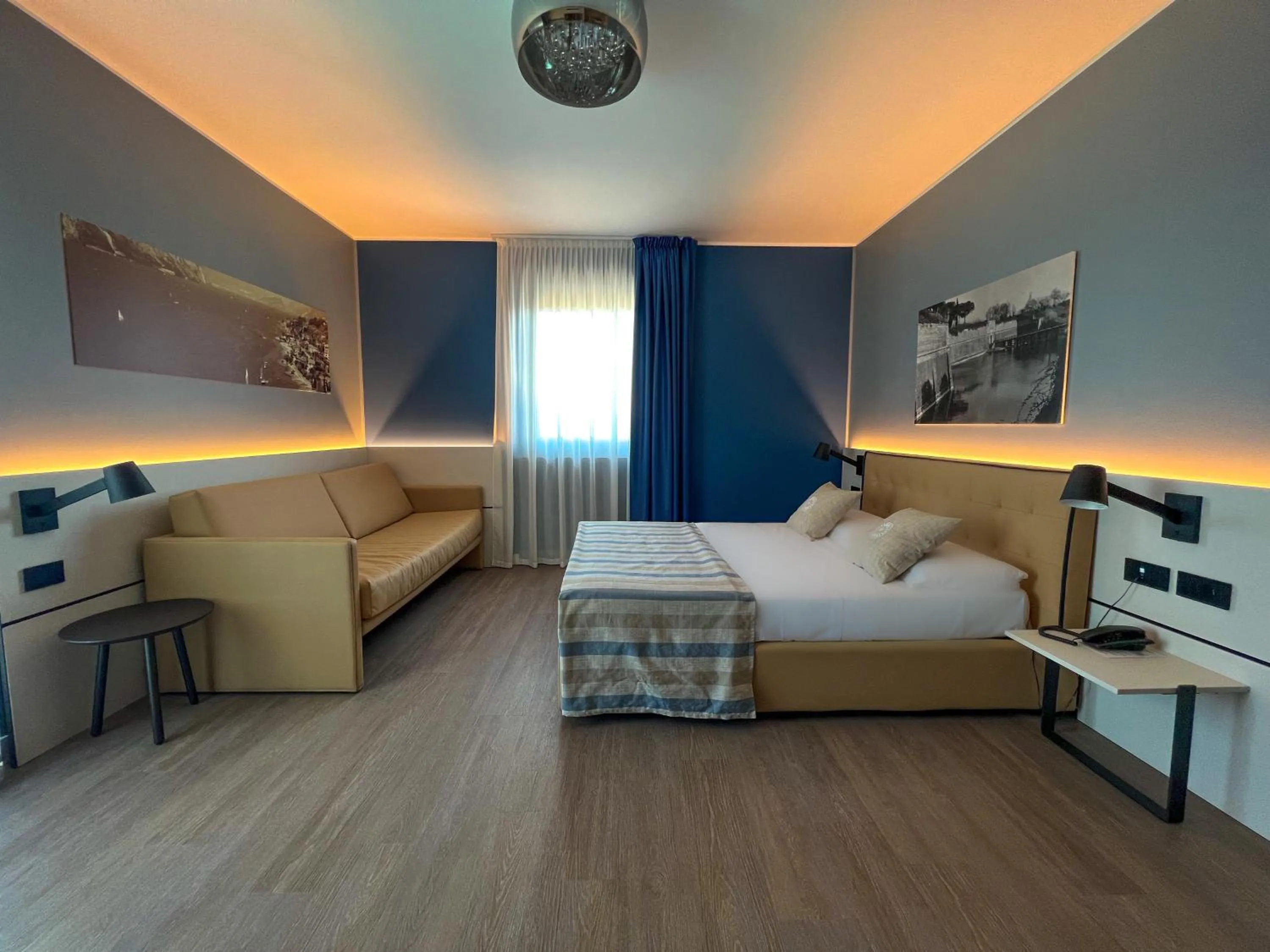 Bed in Hotel Puccini