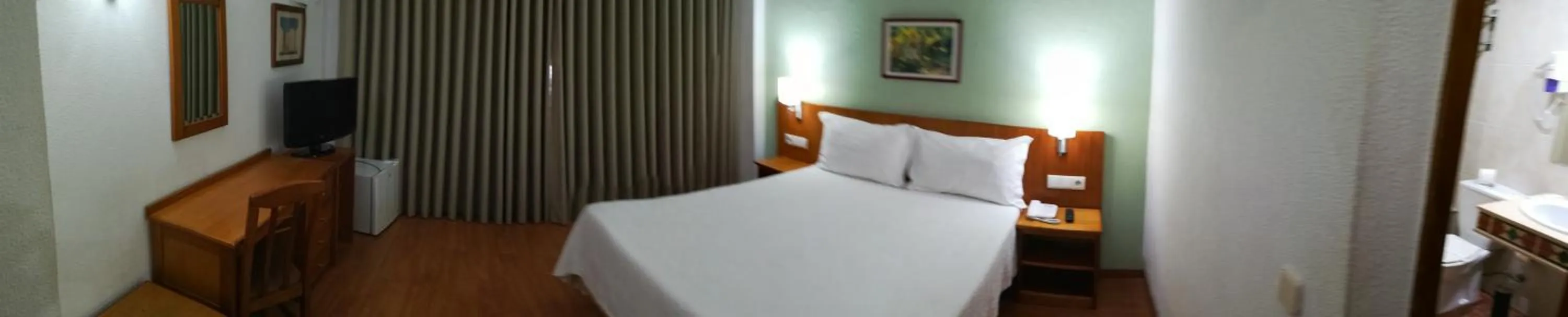 Bed in Hotel Dom Vilas