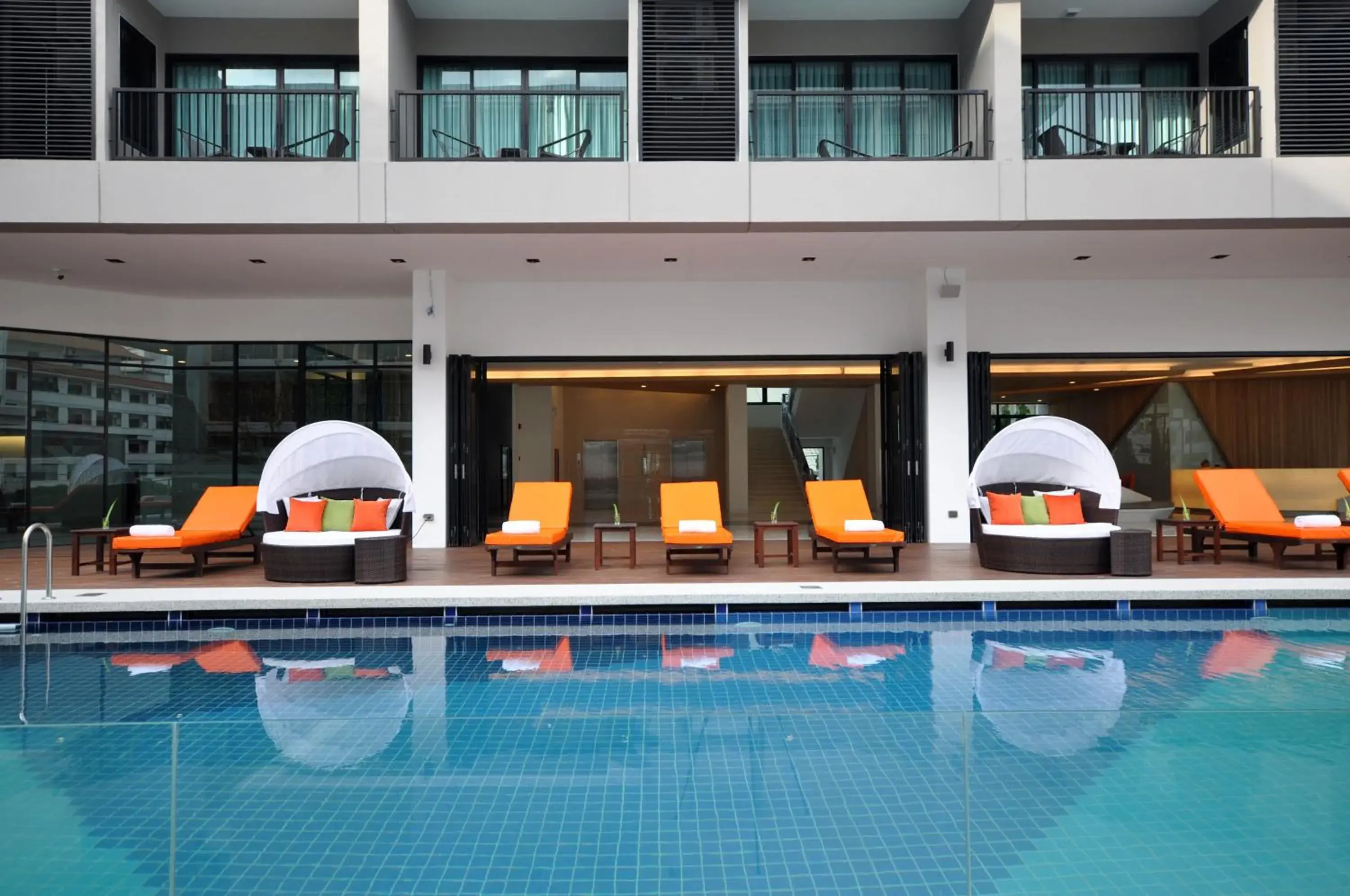 Swimming pool, Property Building in J Inspired Hotel Pattaya (SHA Plus)