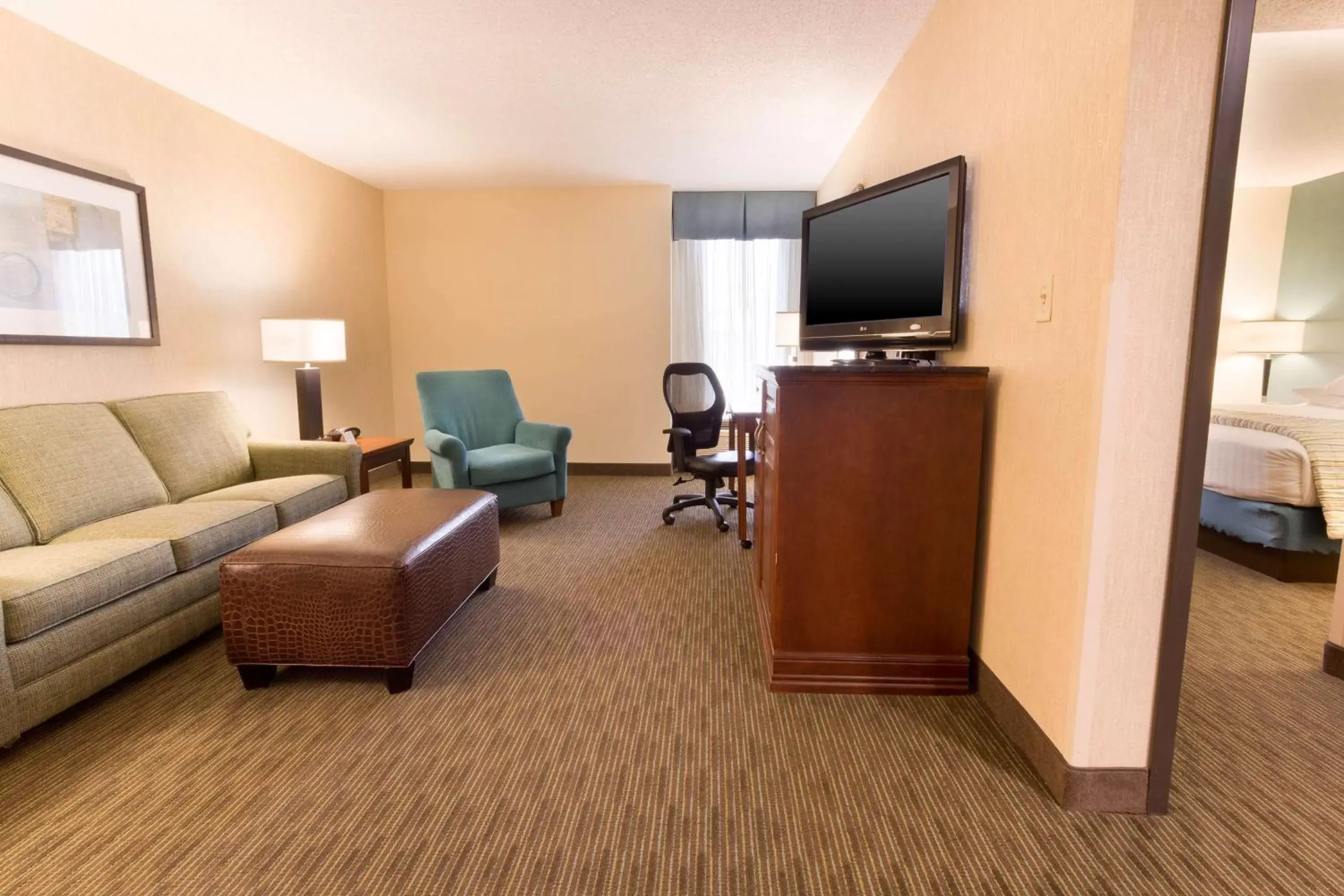 Photo of the whole room, TV/Entertainment Center in Drury Inn & Suites St. Louis-Southwest