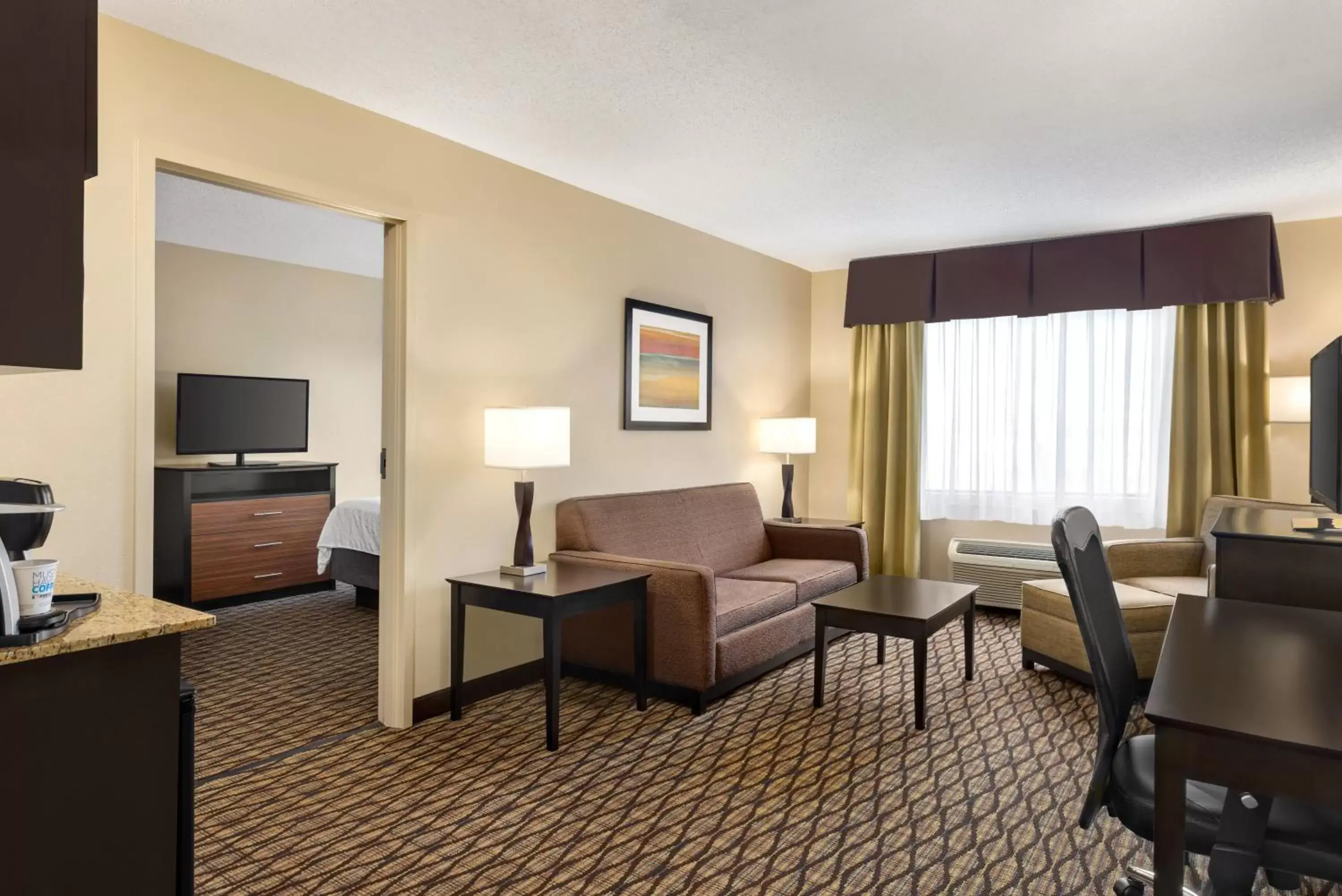 Photo of the whole room, Seating Area in Holiday Inn Express Hotel & Suites Edmond, an IHG Hotel