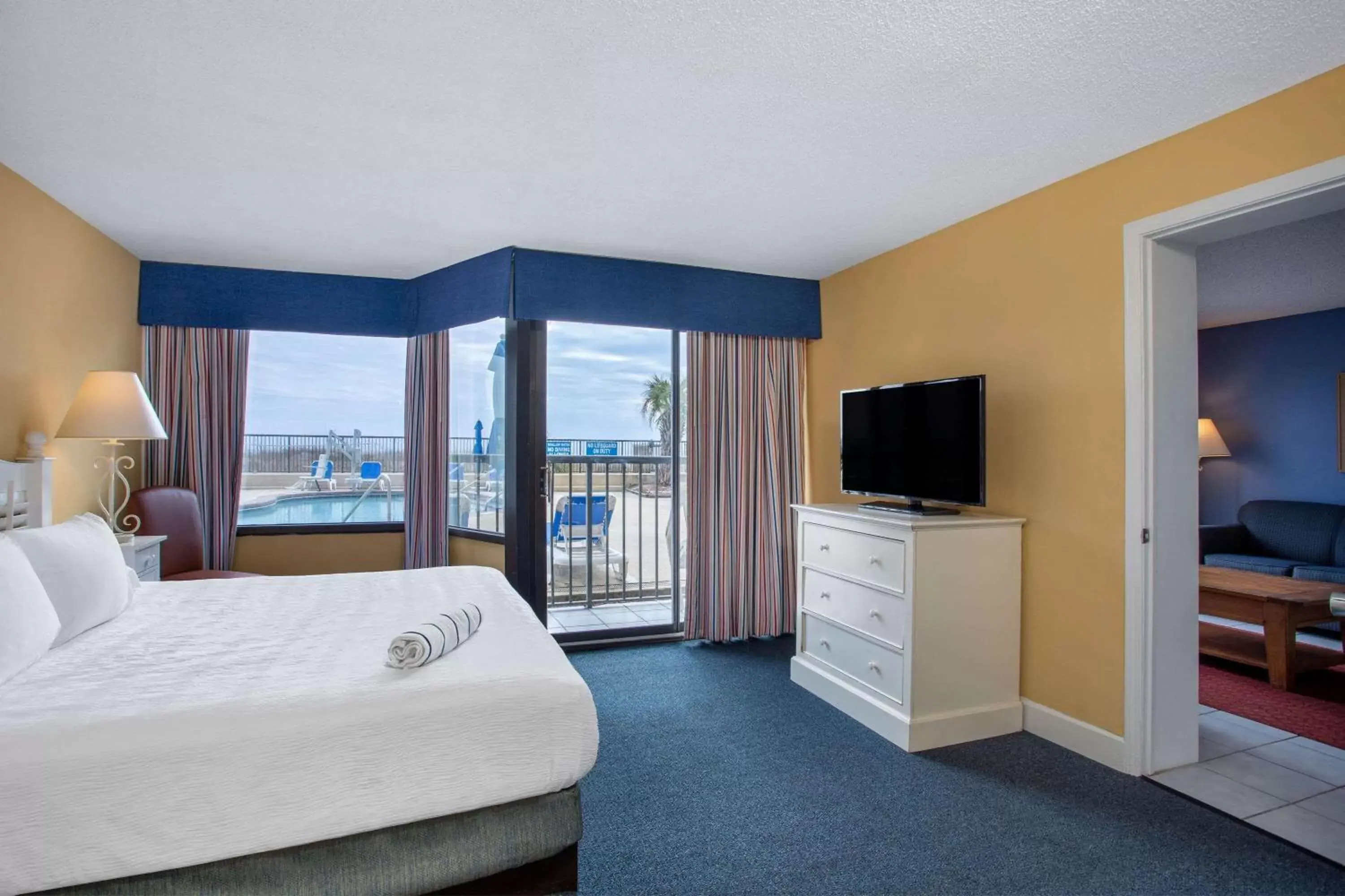 Photo of the whole room, TV/Entertainment Center in Ocean Club Resort Myrtle Beach a Ramada by Wyndham