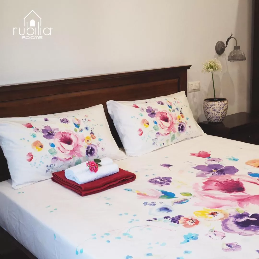 Bed in Rubilia Rooms Pompei