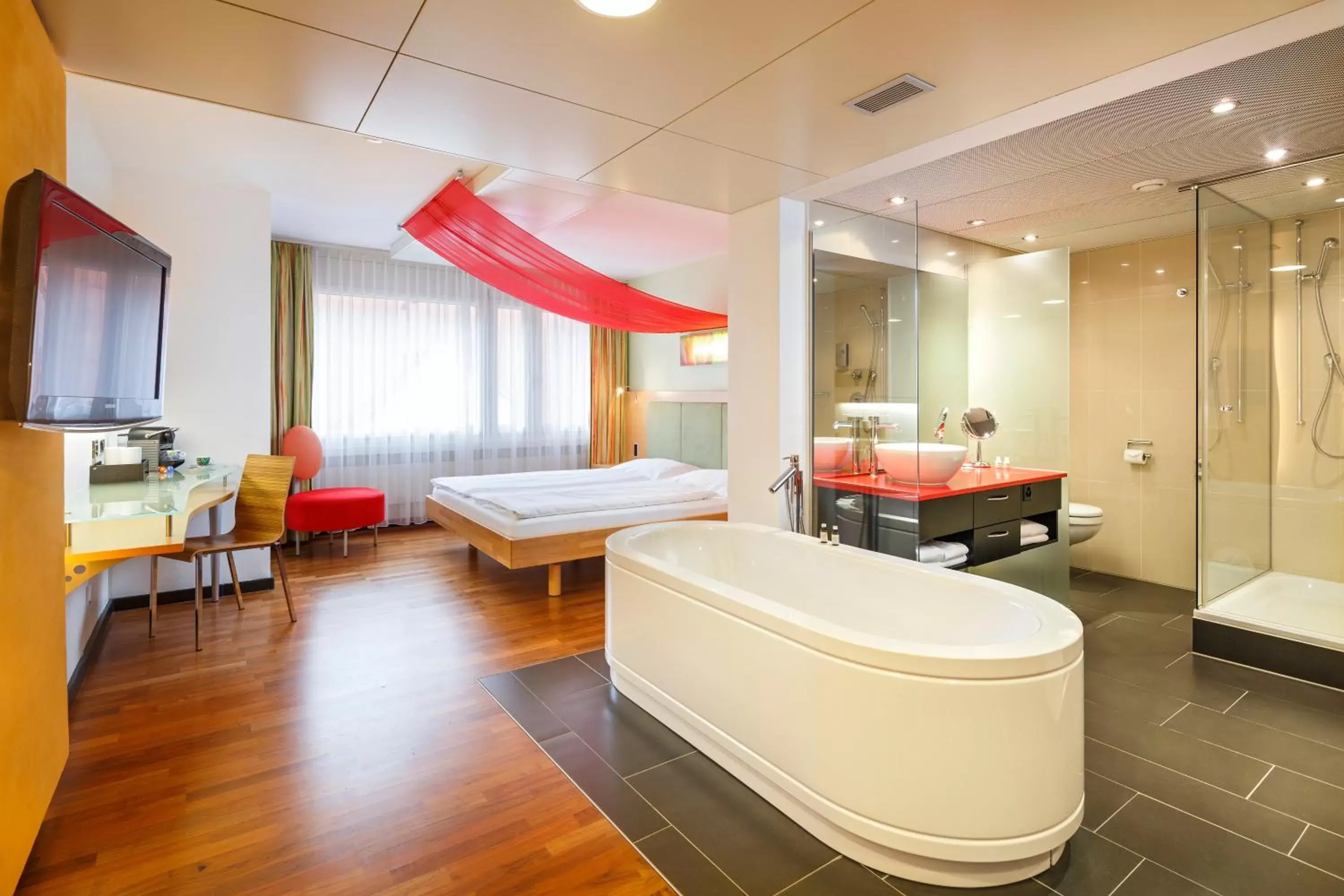 Photo of the whole room, Bathroom in Ramada by Wyndham Baden Hotel du Parc