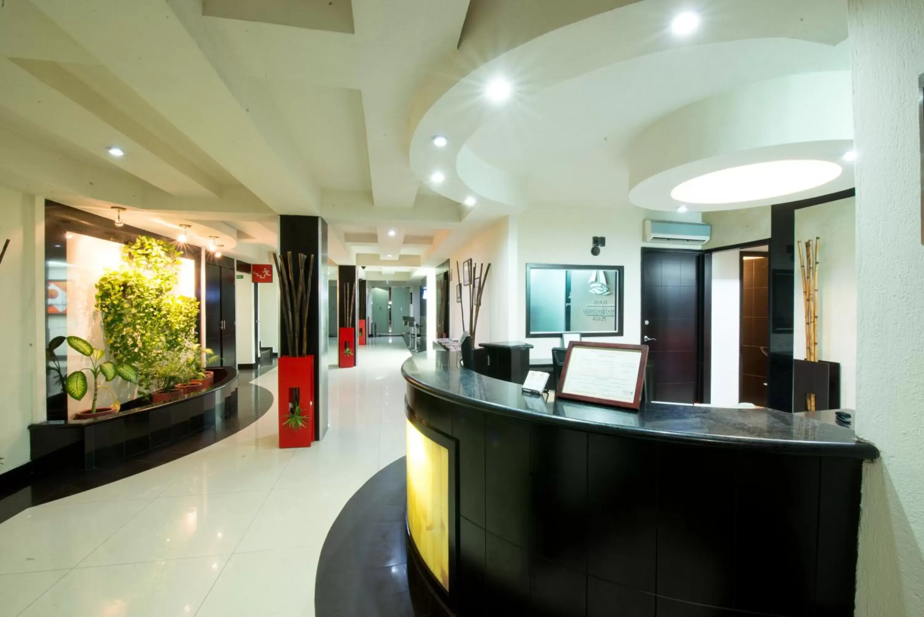 Lobby or reception in Hotel Portonovo Plaza Malecon Lobby or reception in Hotel Portonovo Plaza Malecon