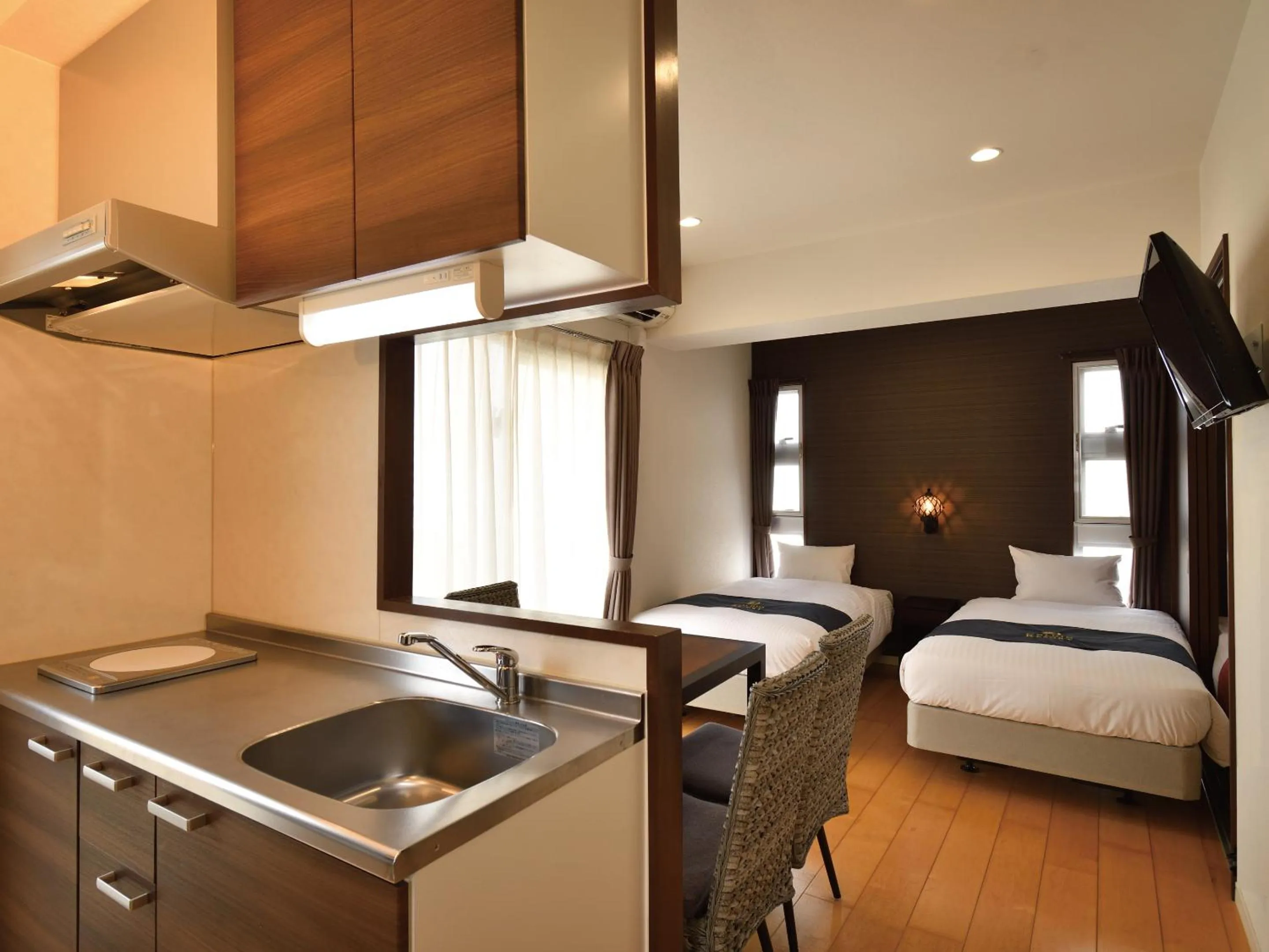 Kitchen or kitchenette, Bed in Condominium L's INN