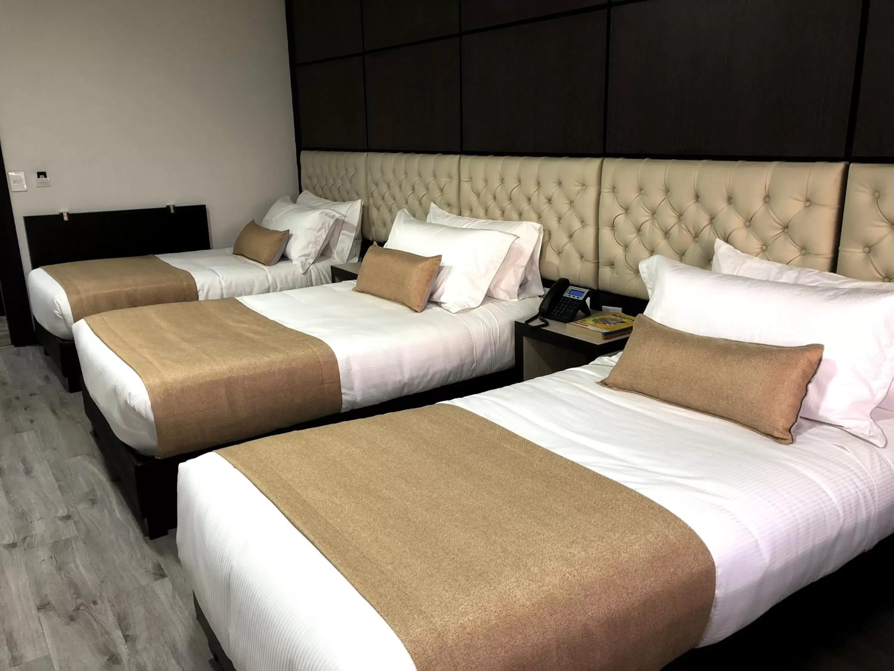 Bed in Hotel American Visa Tower