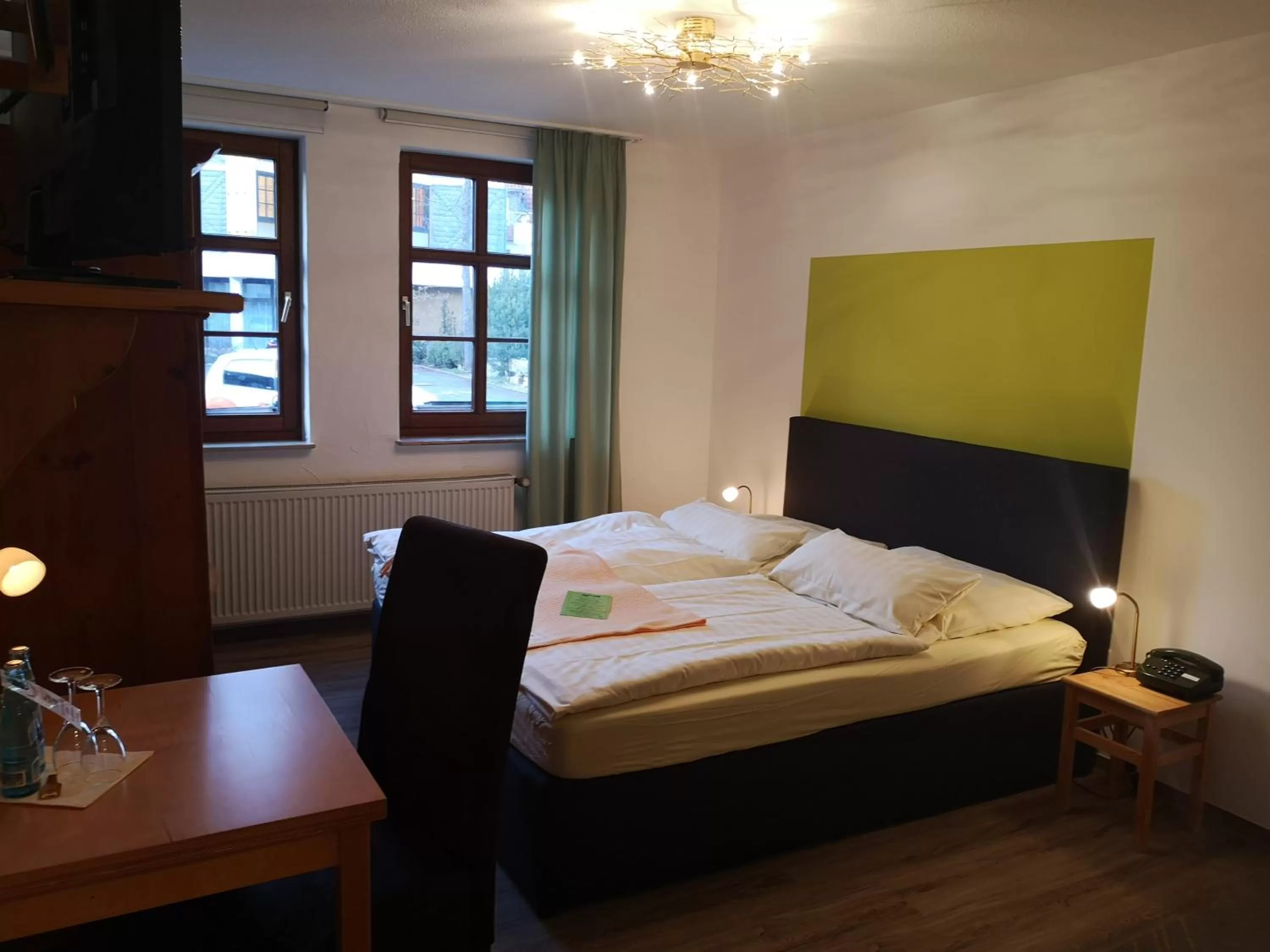 Photo of the whole room, Bed in Hotel Goldflair am Rathaus