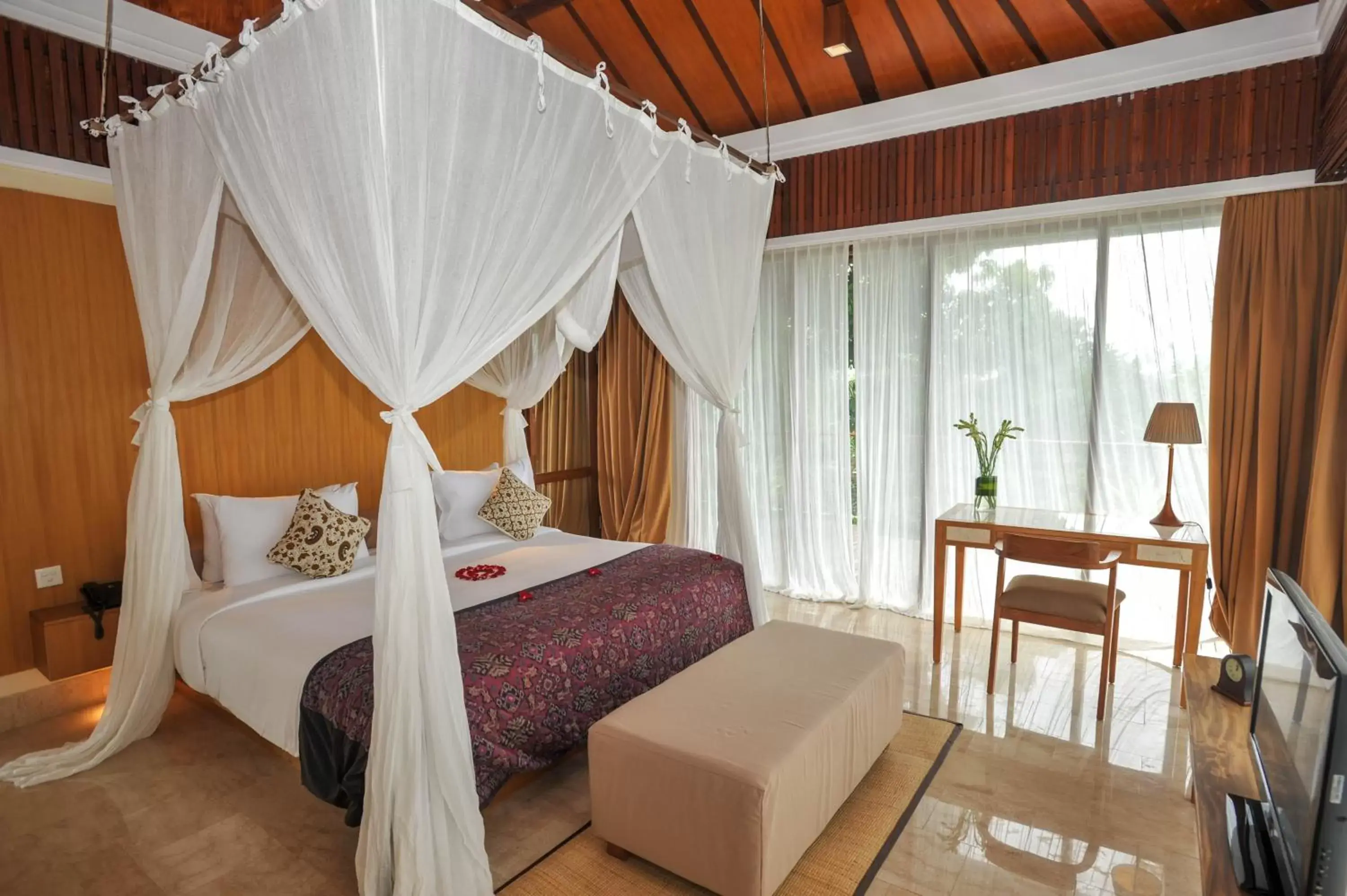 Bedroom, Bed in Komaneka at Rasa Sayang Ubud