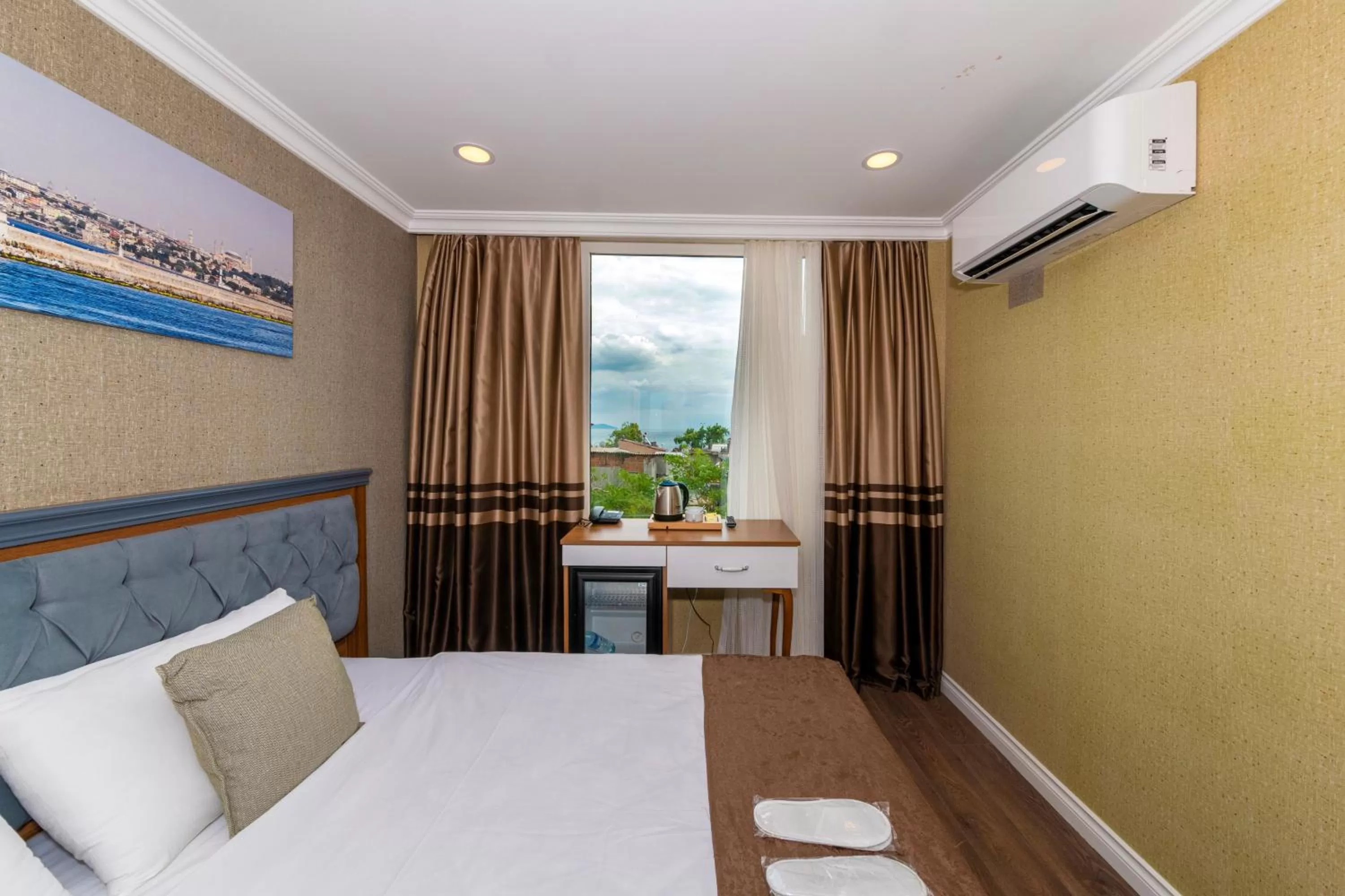 Bed in Golden Sand Hotel