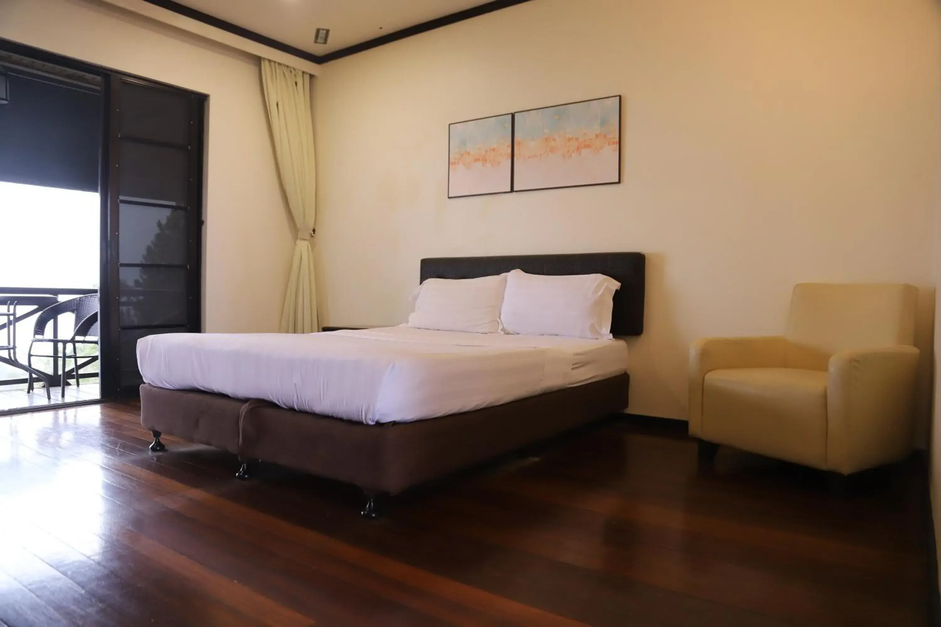 Bed in Kasih Sayang Hill Resort
