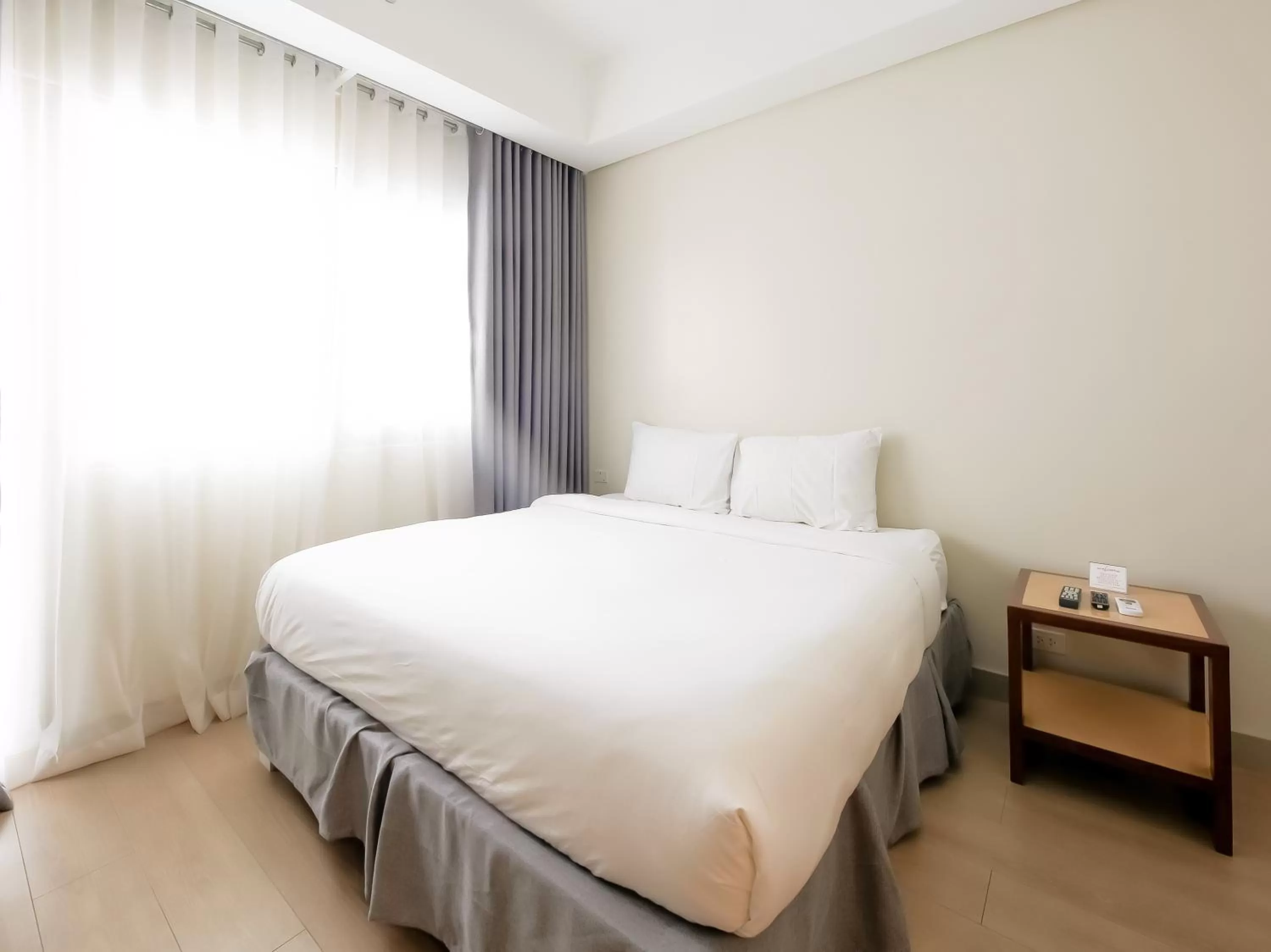 Photo of the whole room, Bed in Capital O 804 The Residences at Bonifacio Civic Center