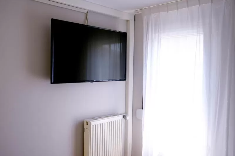 TV and multimedia in Brit Hotel Essentiel REIMS Taissy