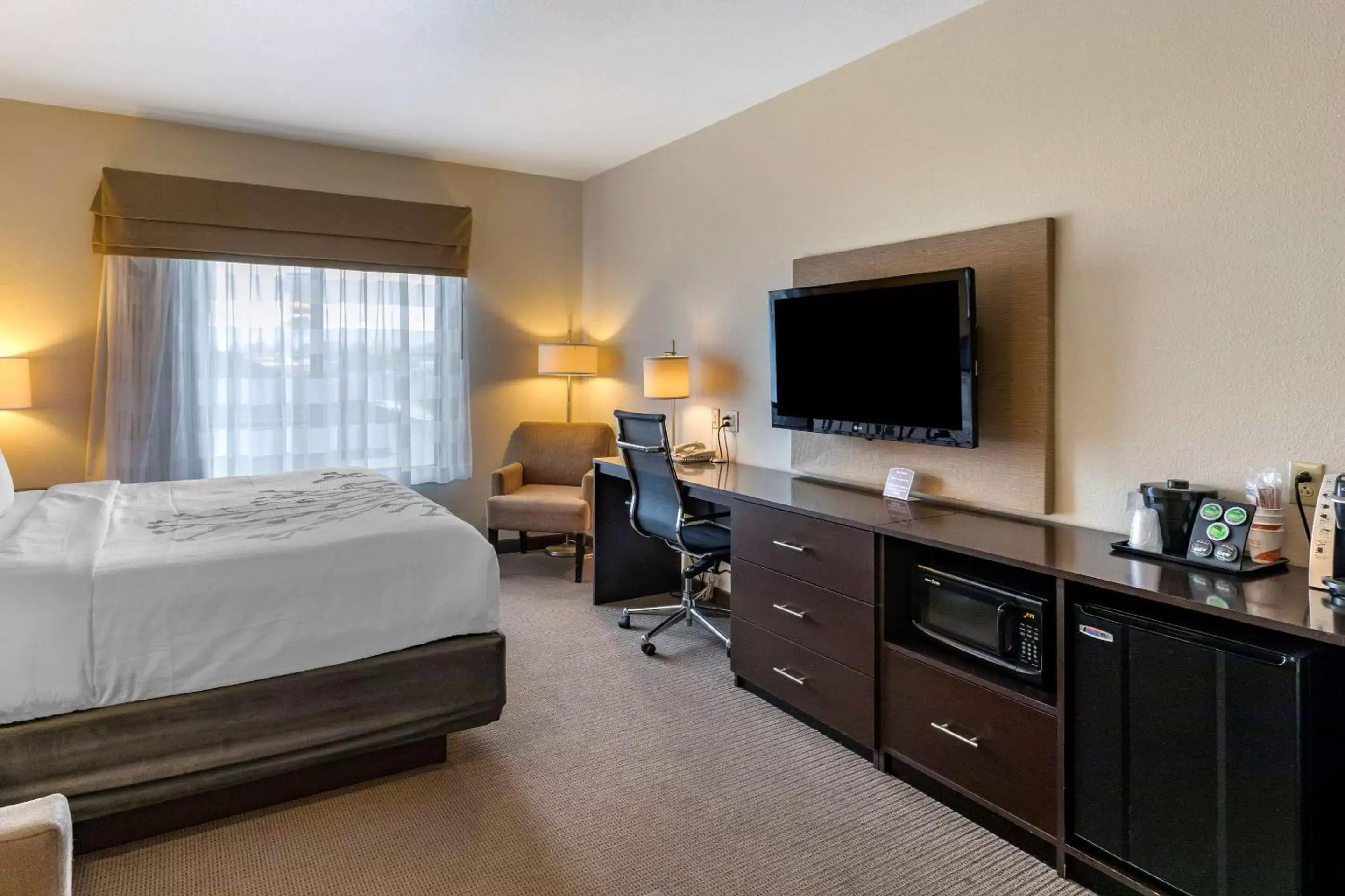 Photo of the whole room, TV/Entertainment Center in Sleep Inn & Suites Miles City