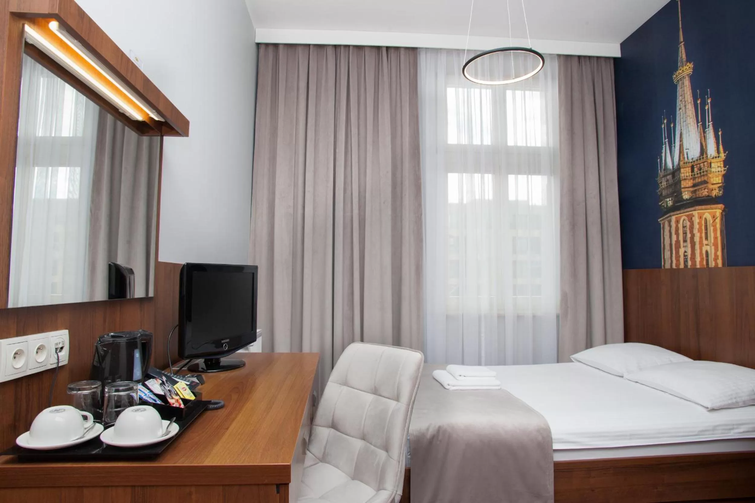 Bed in Hotel Downtown Kraków