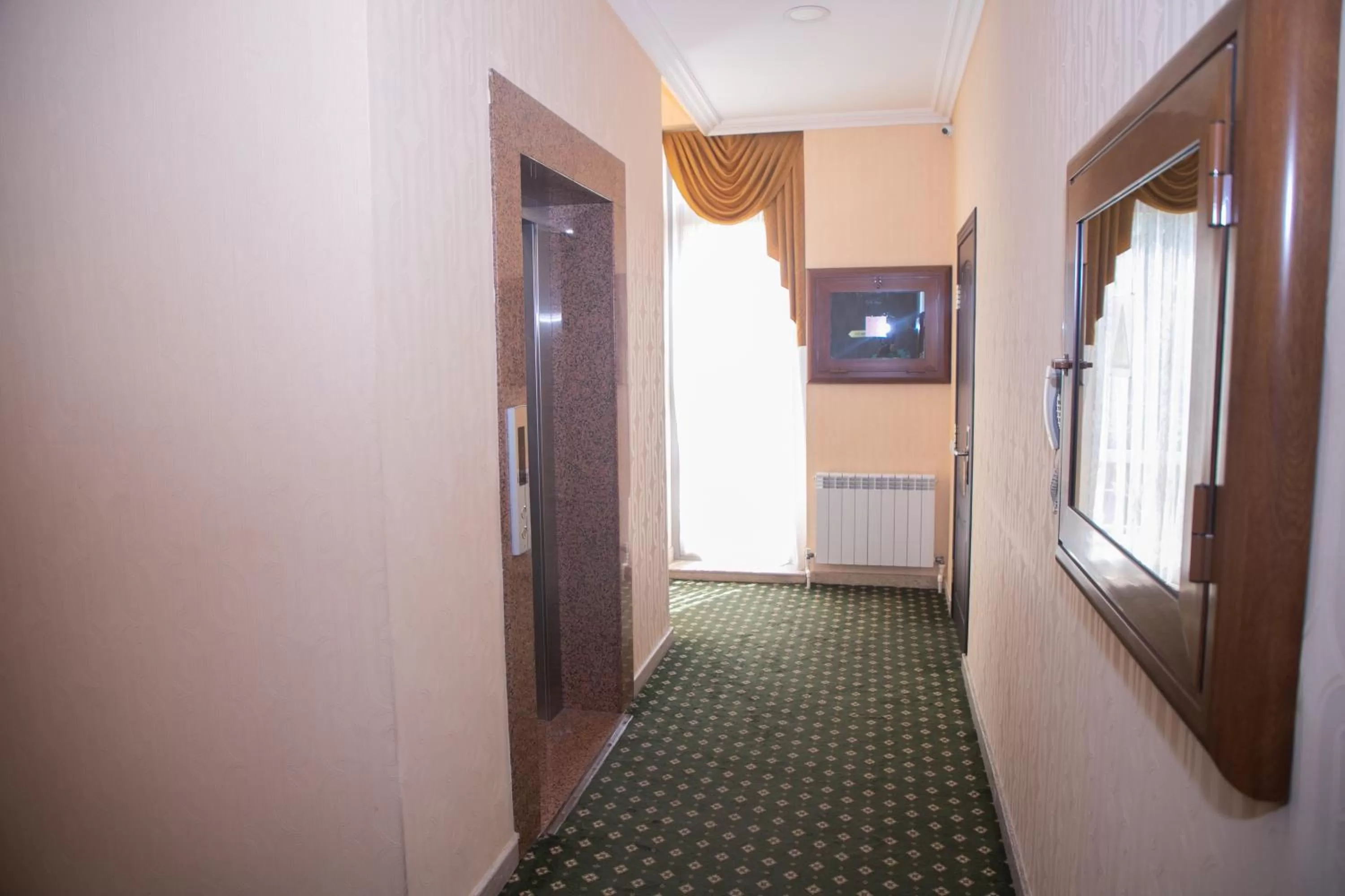 Communal lounge/ TV room in Gloria Hotel