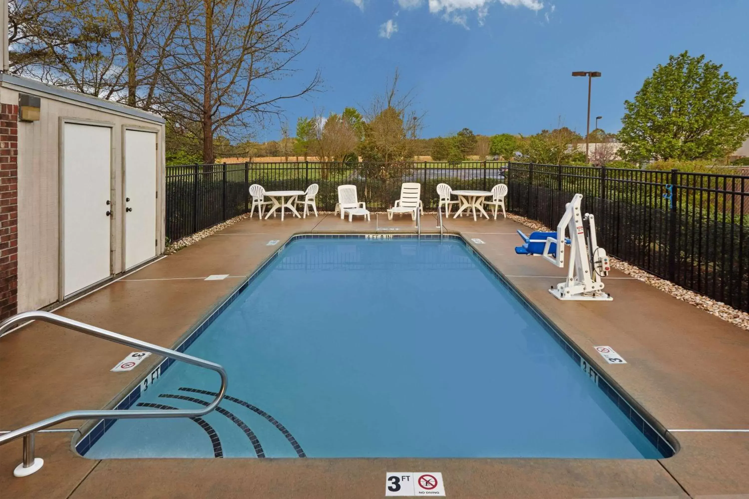 On site, Swimming Pool in Super 8 by Wyndham Greenville