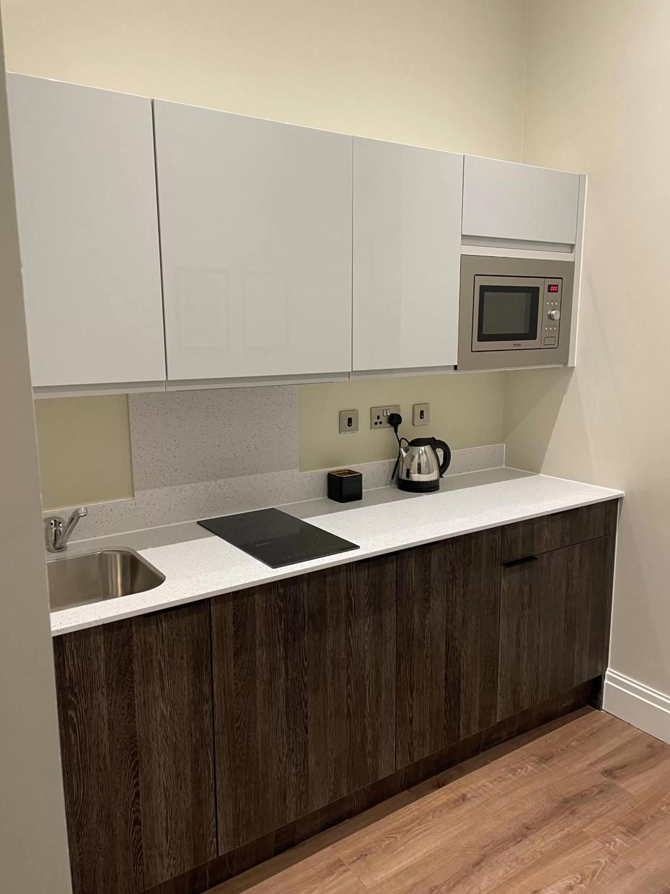 Kitchen or kitchenette in The Gresham Aparthotel