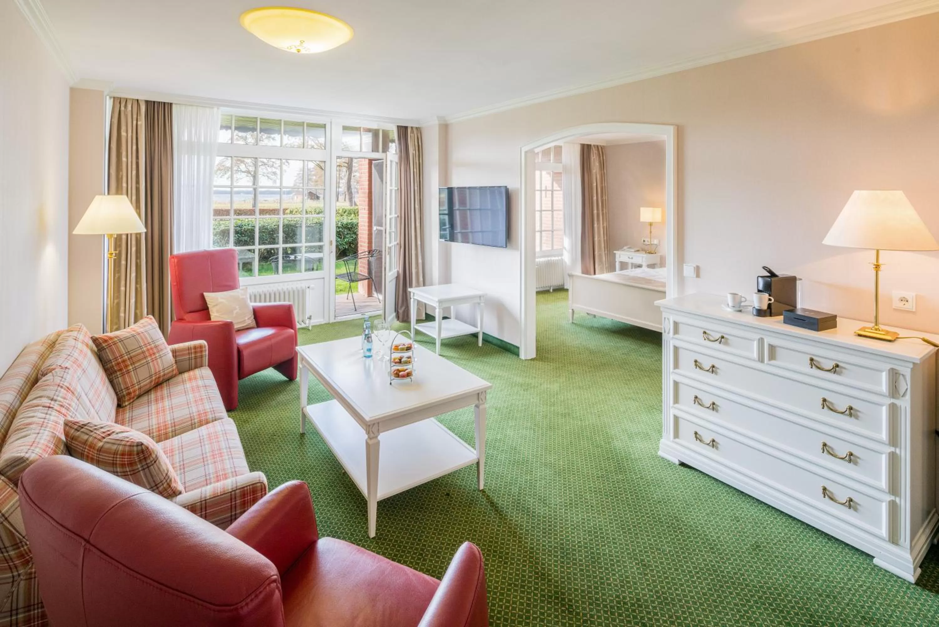 Seating area, Bed in Romantik Hotel Jagdhaus Eiden am See