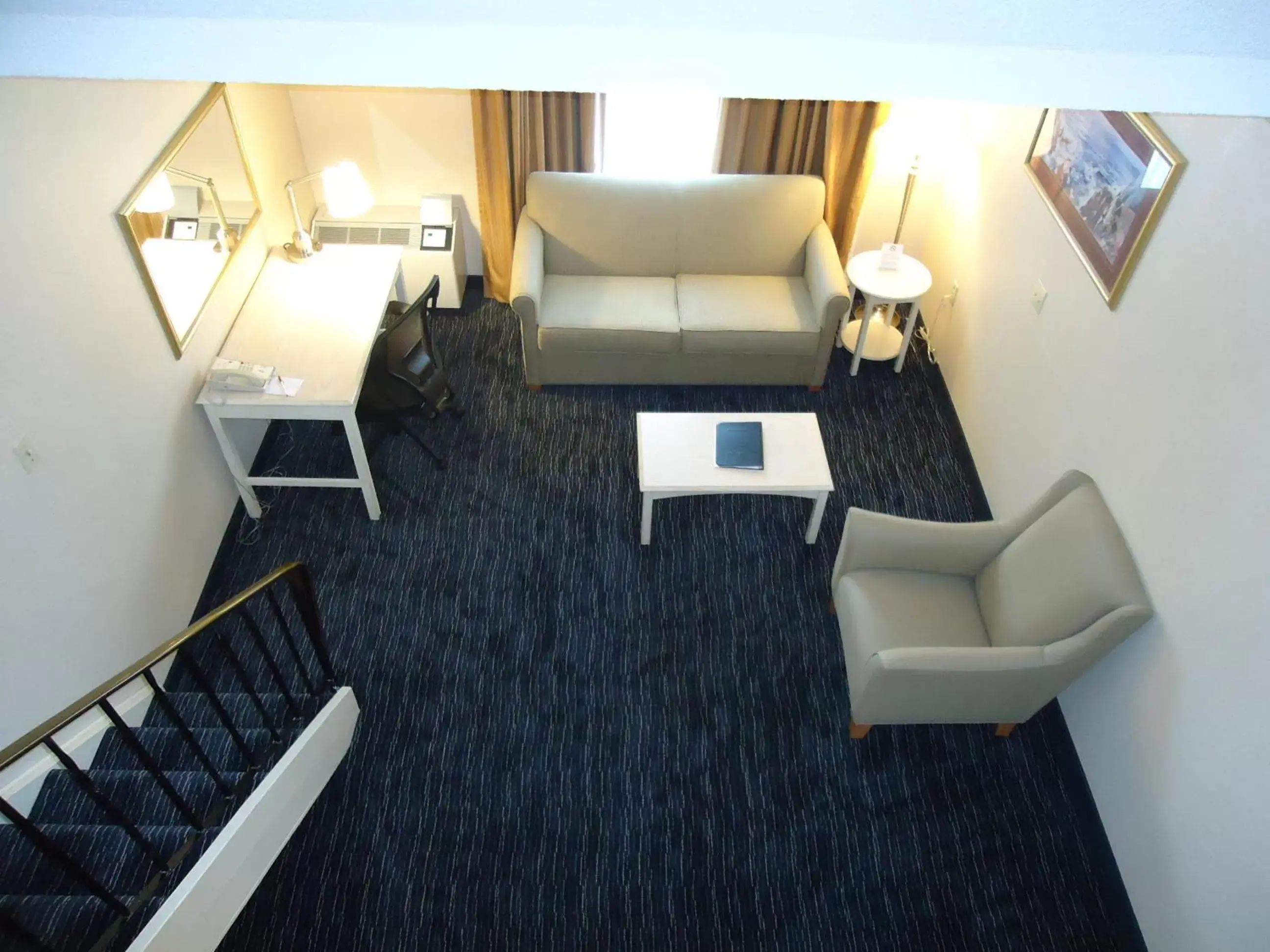 Photo of the whole room, Seating Area in Ramada by Wyndham Trenton