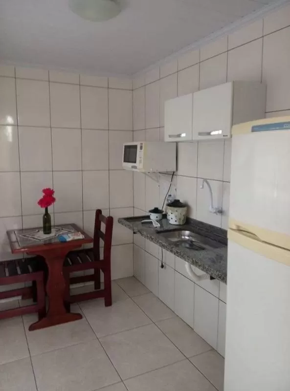 Kitchen or kitchenette in Pousada Manna