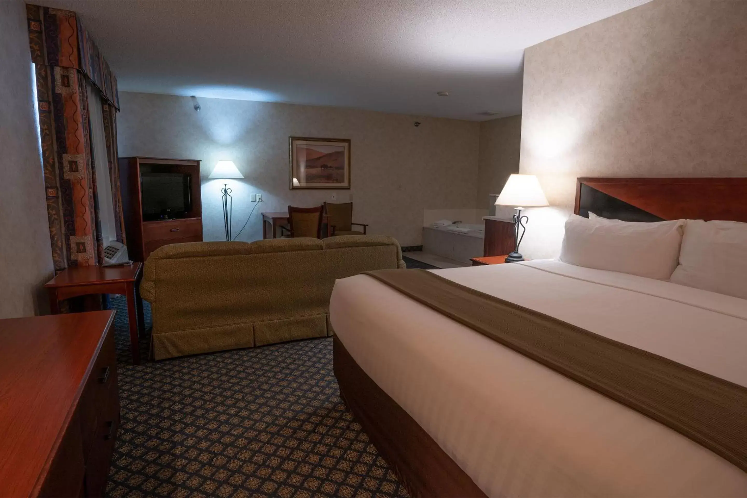 Bed in Miles City Hotel & Suites