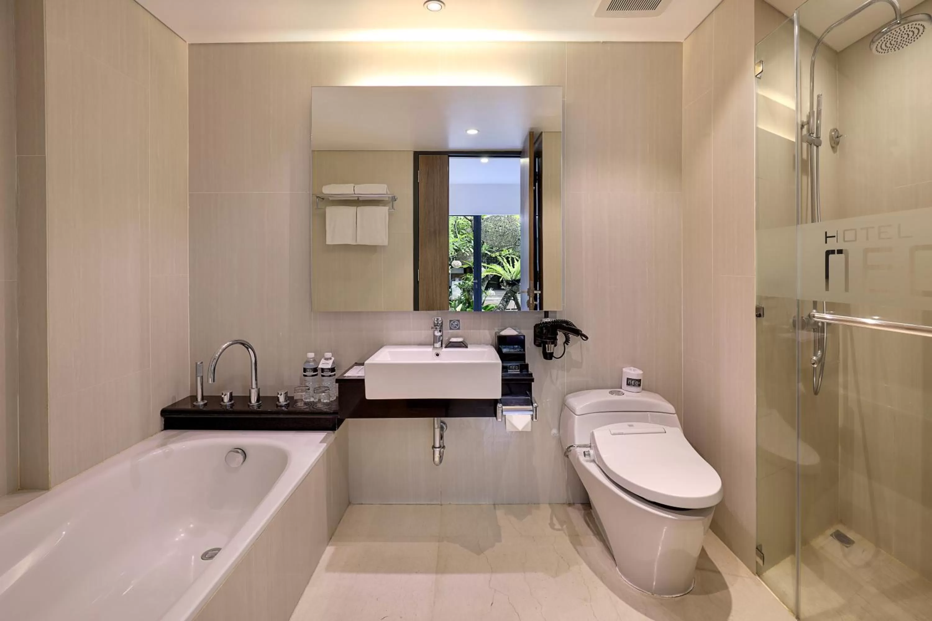 Bathroom in Hotel NEO+ Kuta Legian by ASTON
