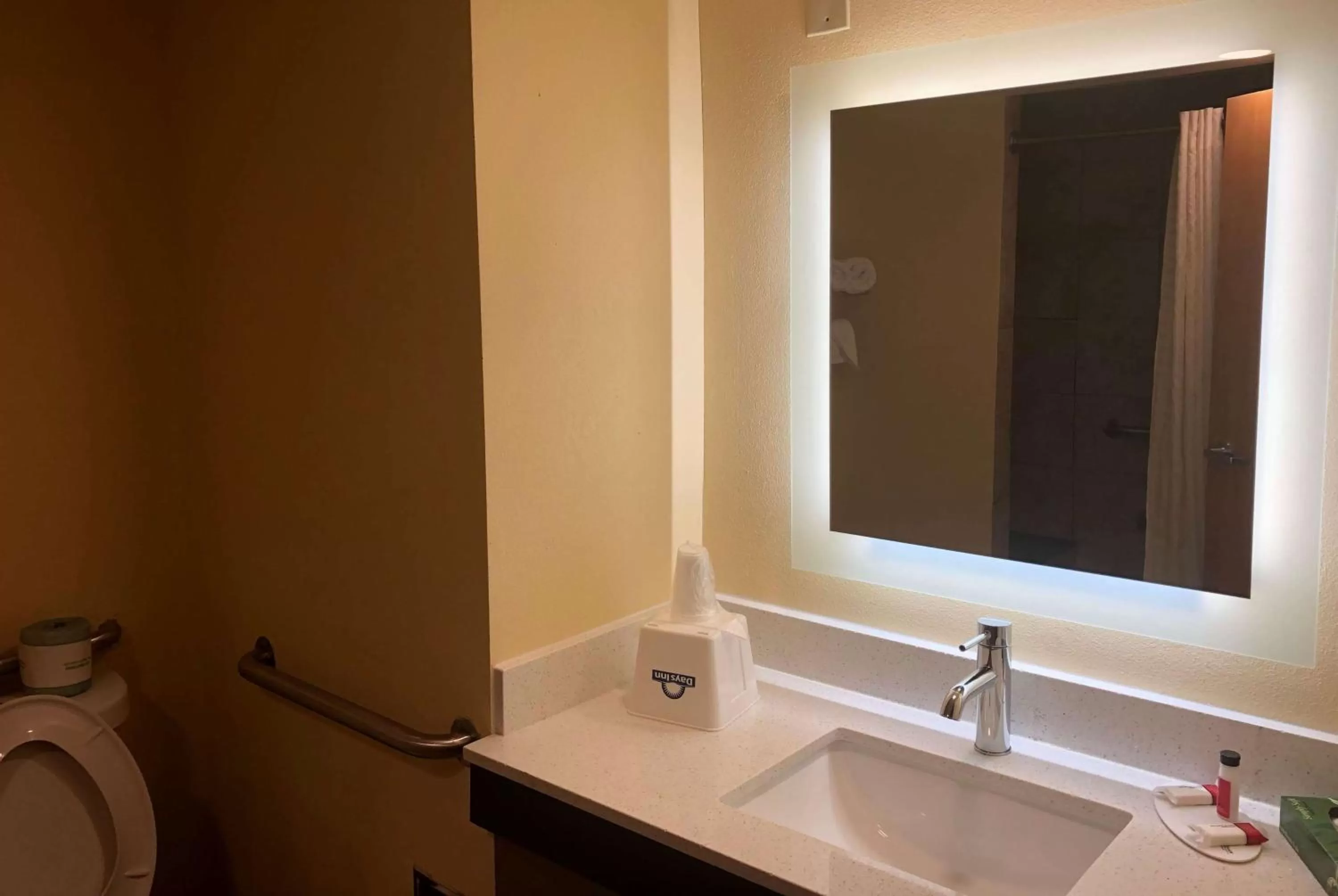 Bathroom in Days Inn by Wyndham Grove City Columbus South