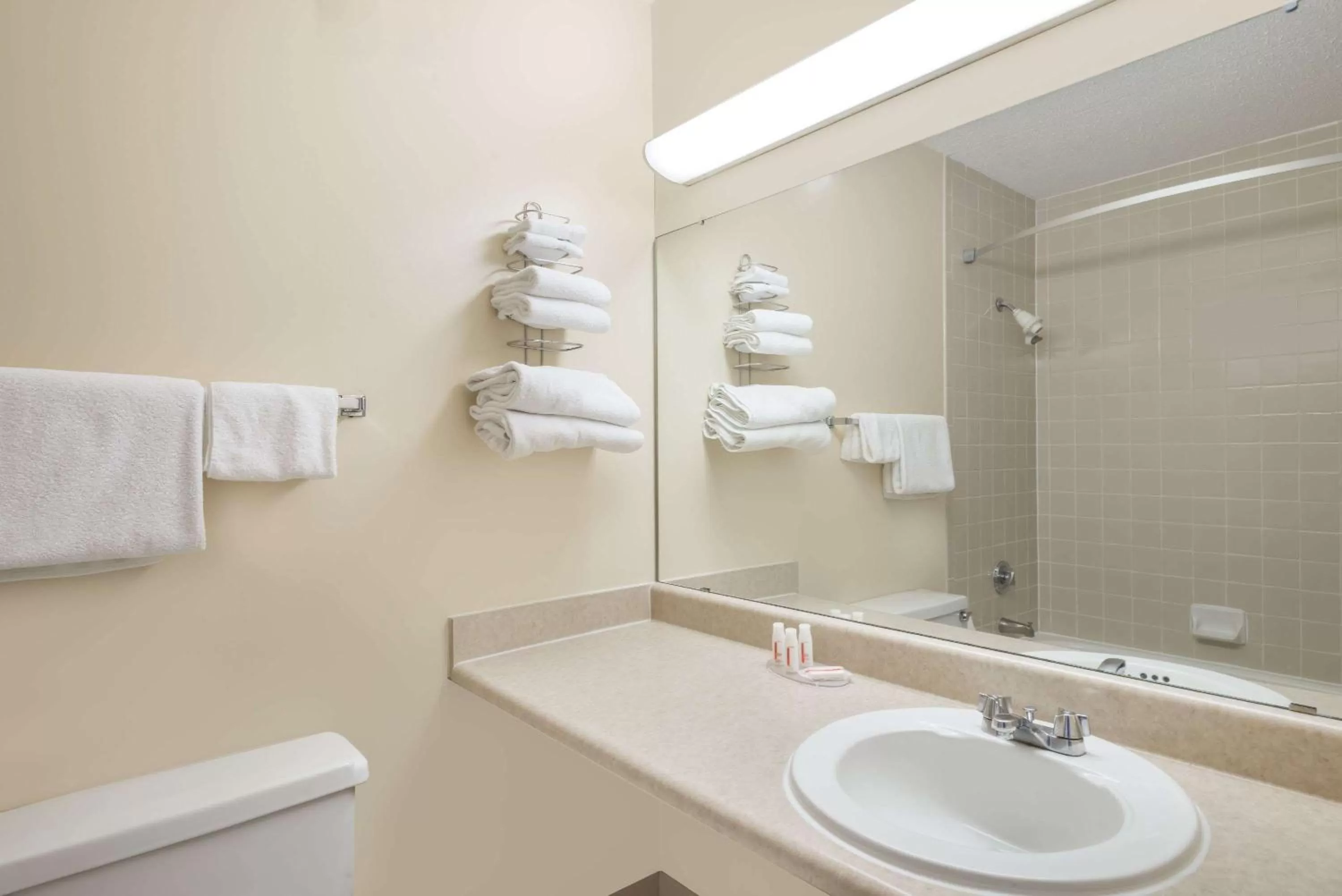 Bathroom in Ramada by Wyndham Watertown Thousand