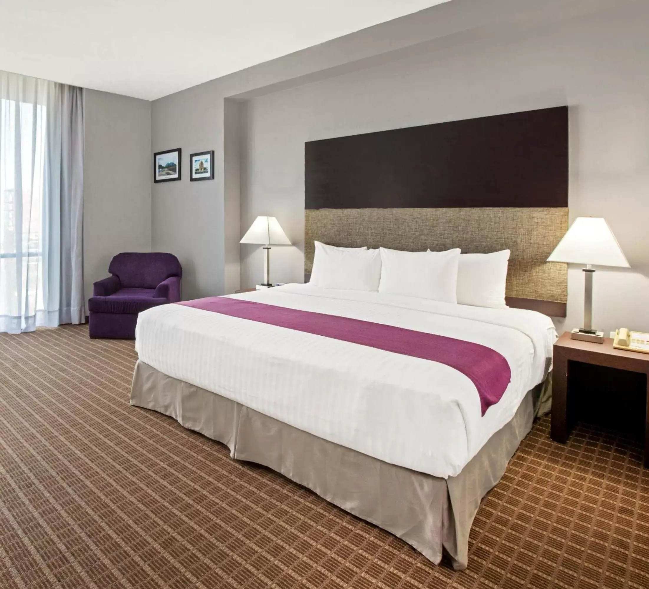 Bedroom, Bed in CHN Hotel Monterrey Centro, Trademark Collection by Wyndham