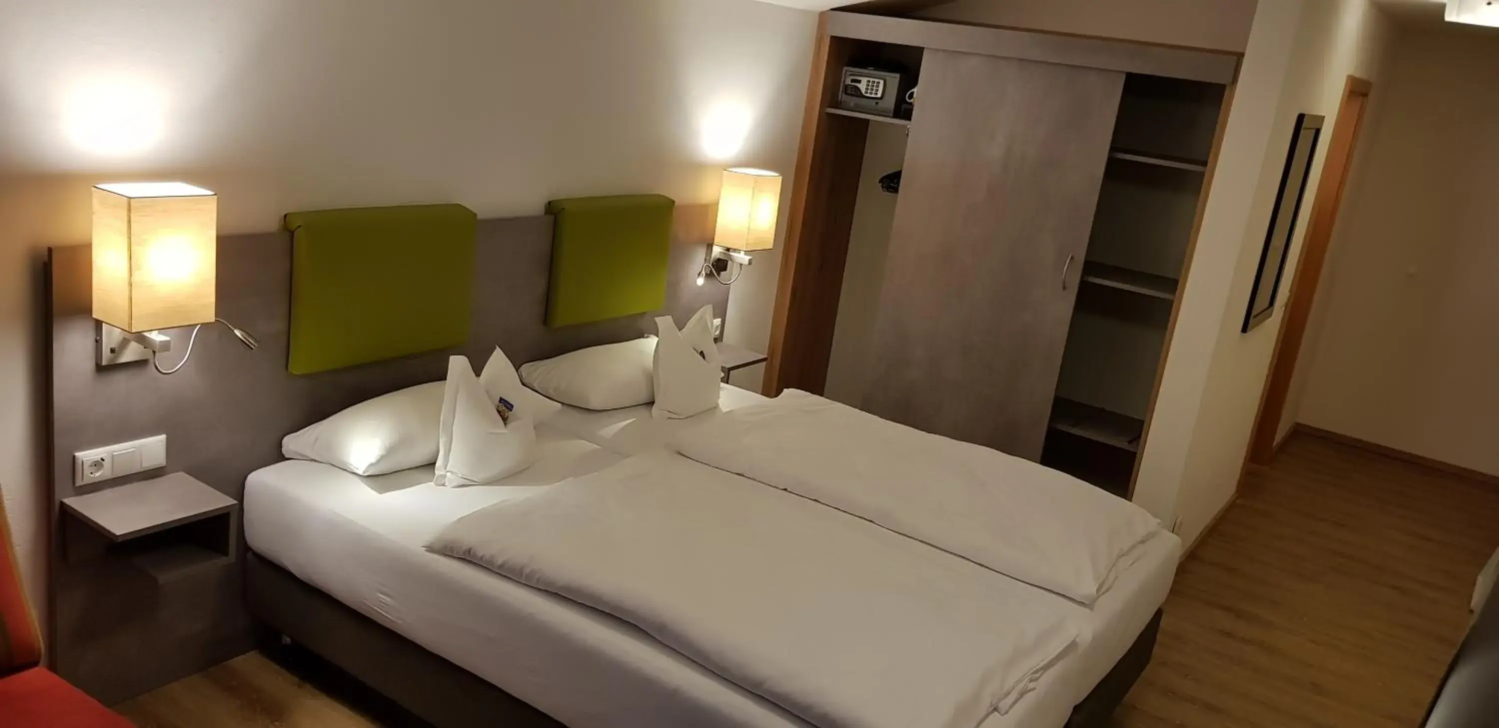 Bed in Hotel-Restaurant Bellevue