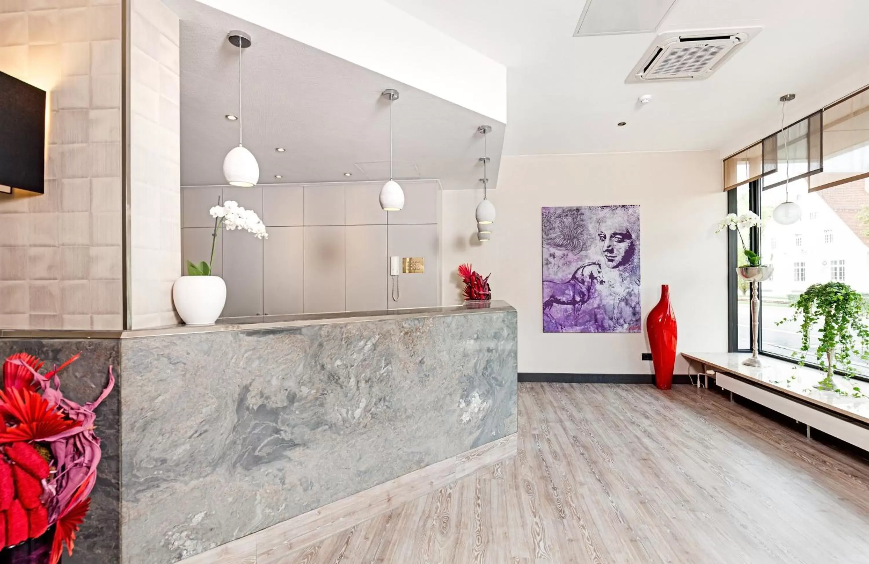 Lobby or reception in Leonardo Hotel Munich City North Lobby or reception in Leonardo Hotel Munich City North